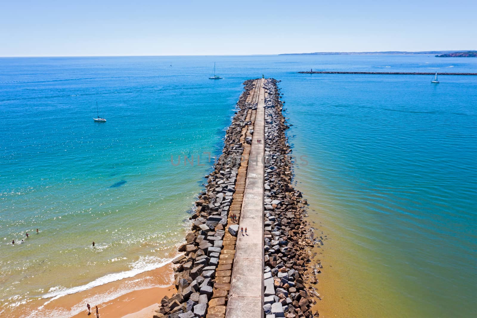 Top shot from breakwater at the entrance of Portimao harbor in t by devy