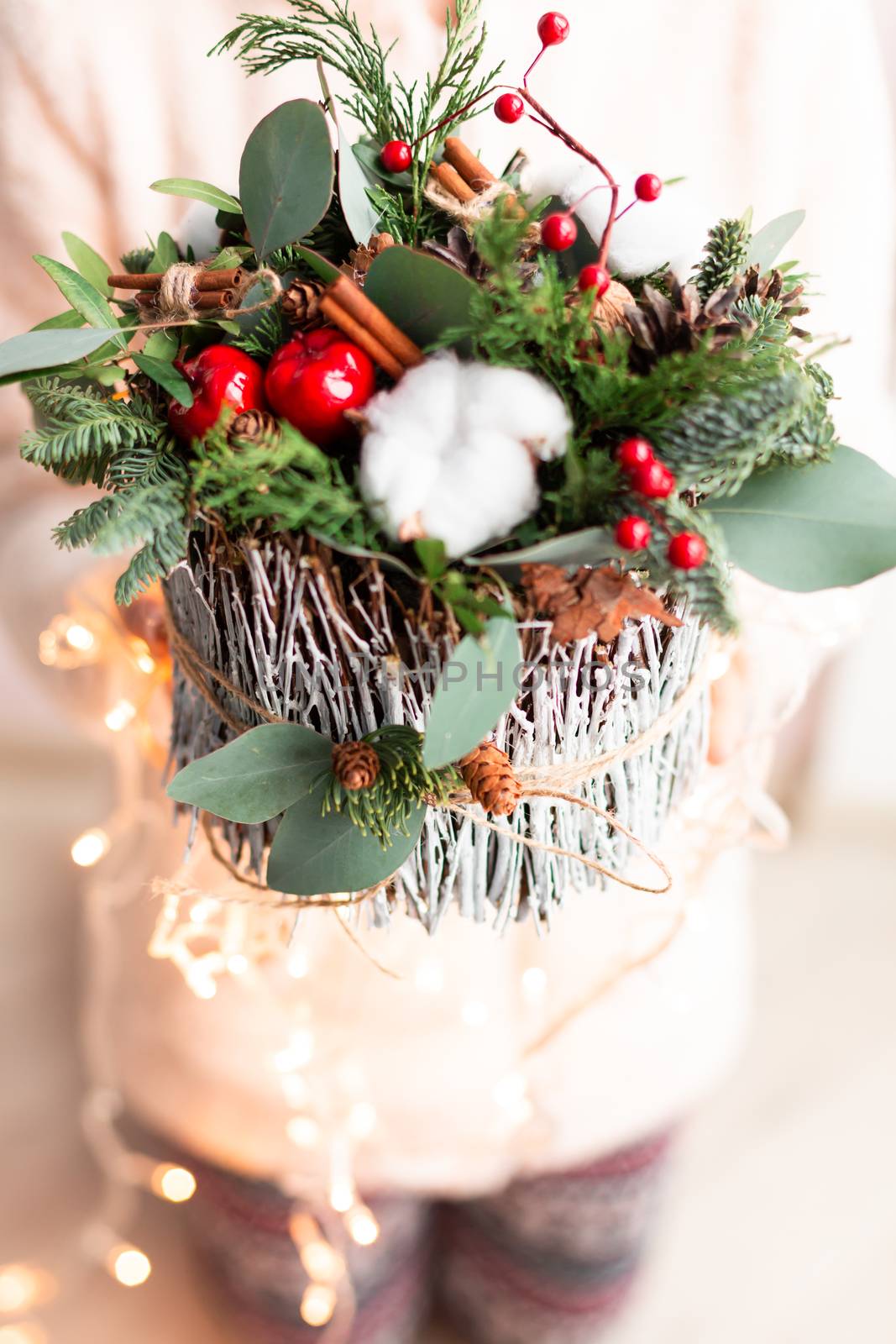 Christmas decoration with carnations, chrysanthemums santini, brunia and fir. Christmas spirit and mood