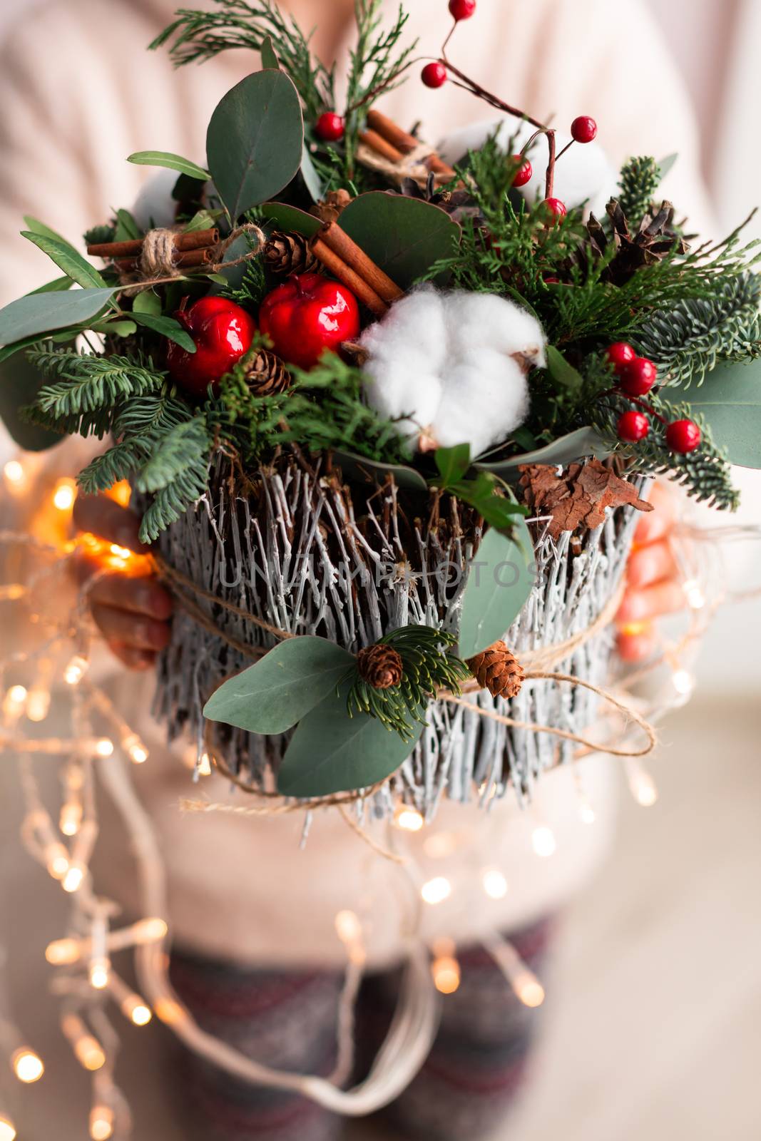 Christmas decoration with carnations, chrysanthemums santini, brunia and fir. Christmas spirit and mood