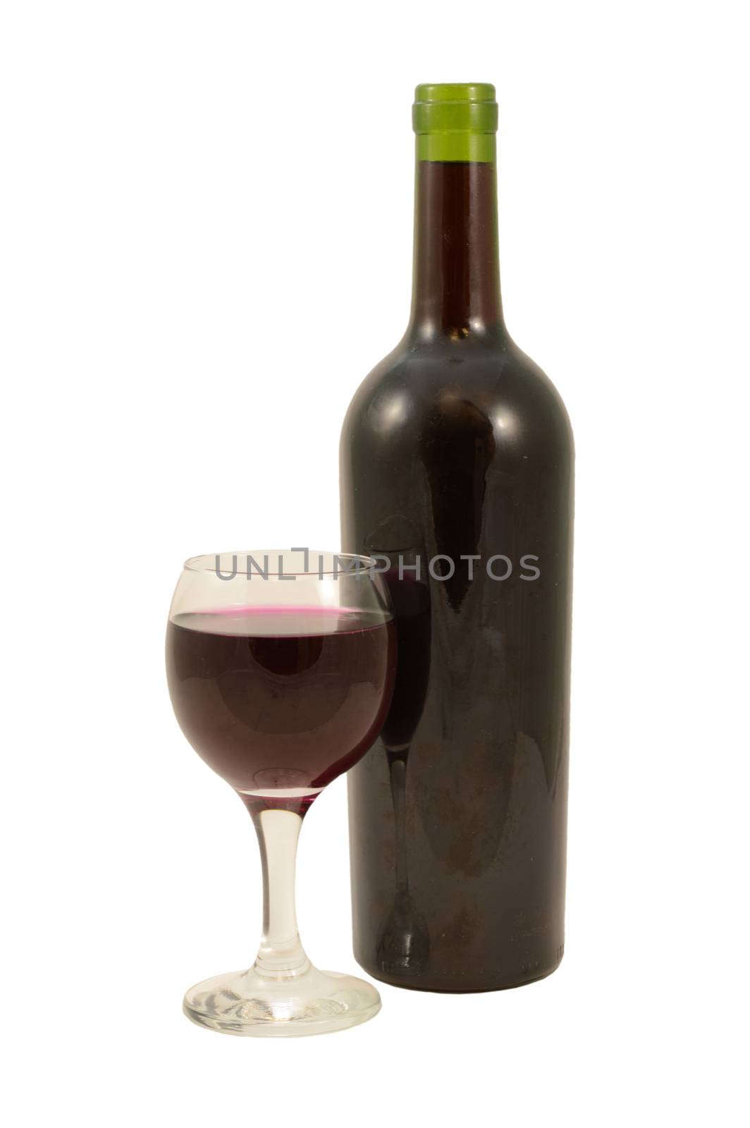 An isolated bottle and glass of red wine over a white background.