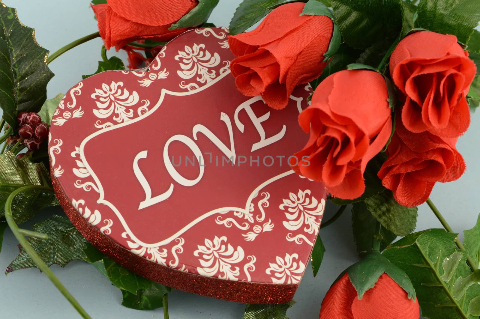 A lovely red heart shaped box for gift giving during a time of celebration and romance.