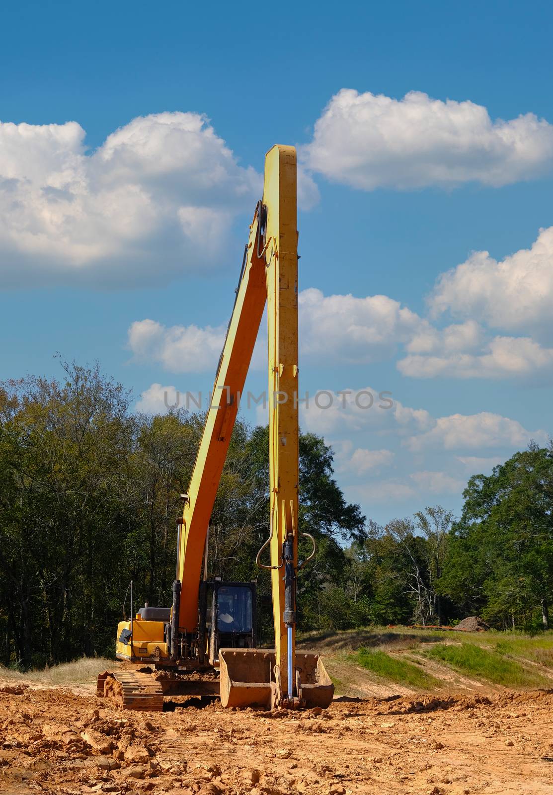 Tall Loader on Graded Construction Site by dbvirago