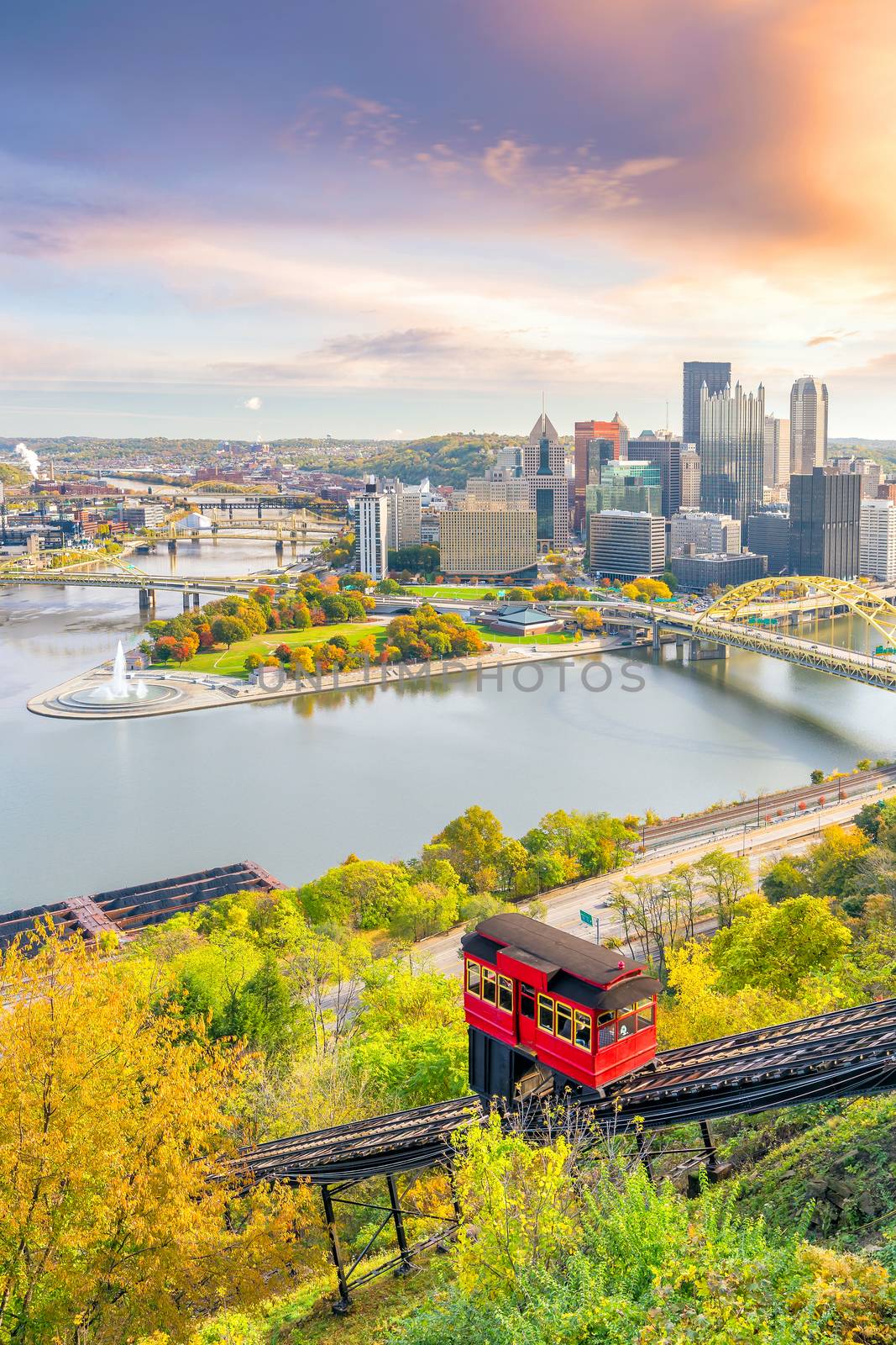 Downtown skyline of Pittsburgh, Pennsylvania at sunset by f11photo