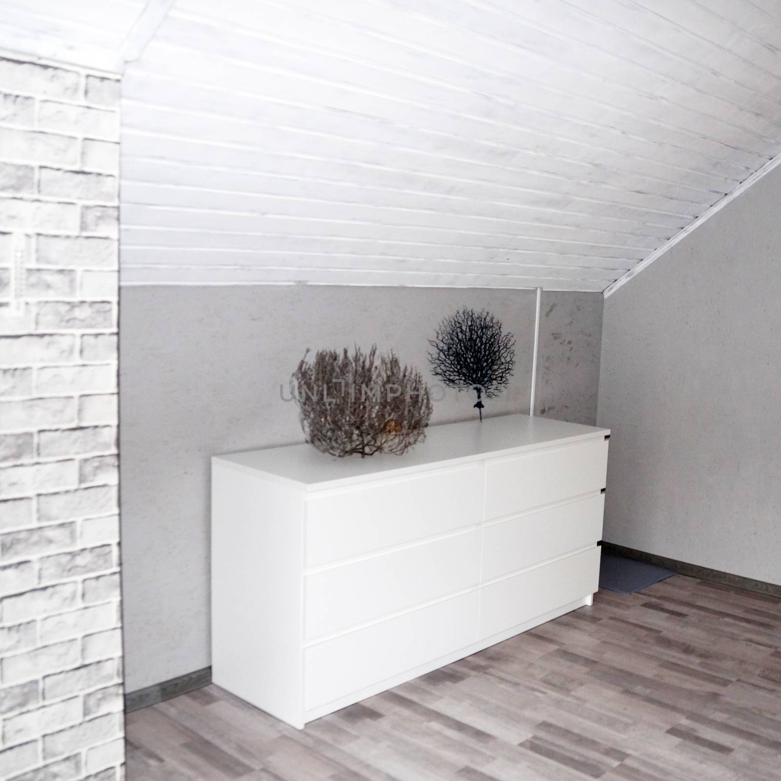 attic interior in white and gray tones by Annado