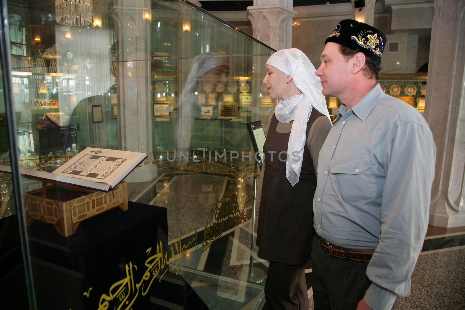 muslim couple walks the islamic museum in the mosque.