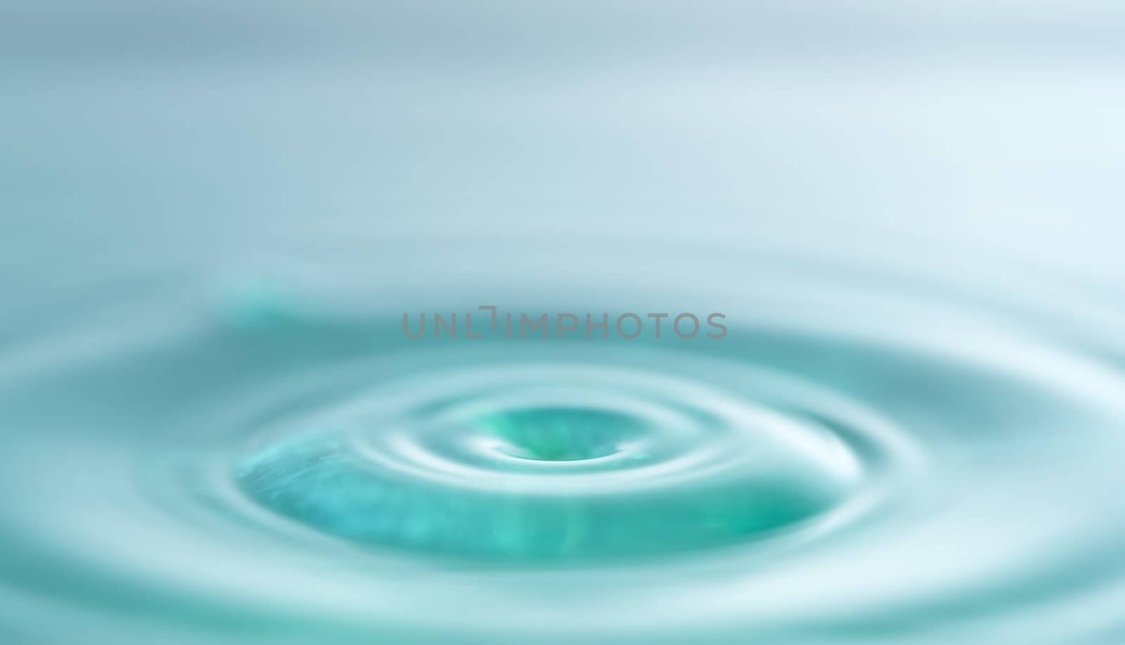 Water droplets science experiment and art concept bright color background
Natural.