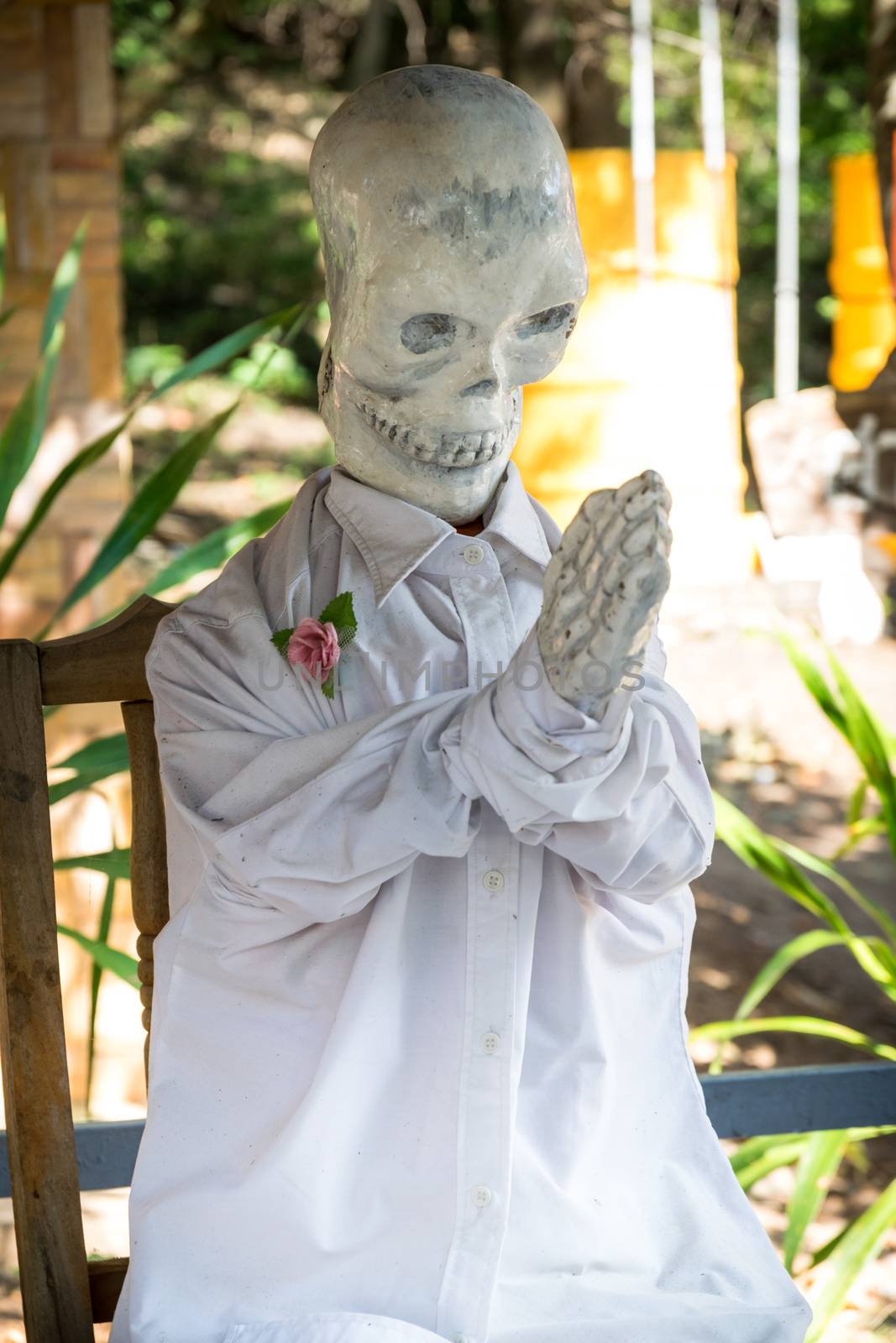 Skeleton wearing a white shirt in the temple.