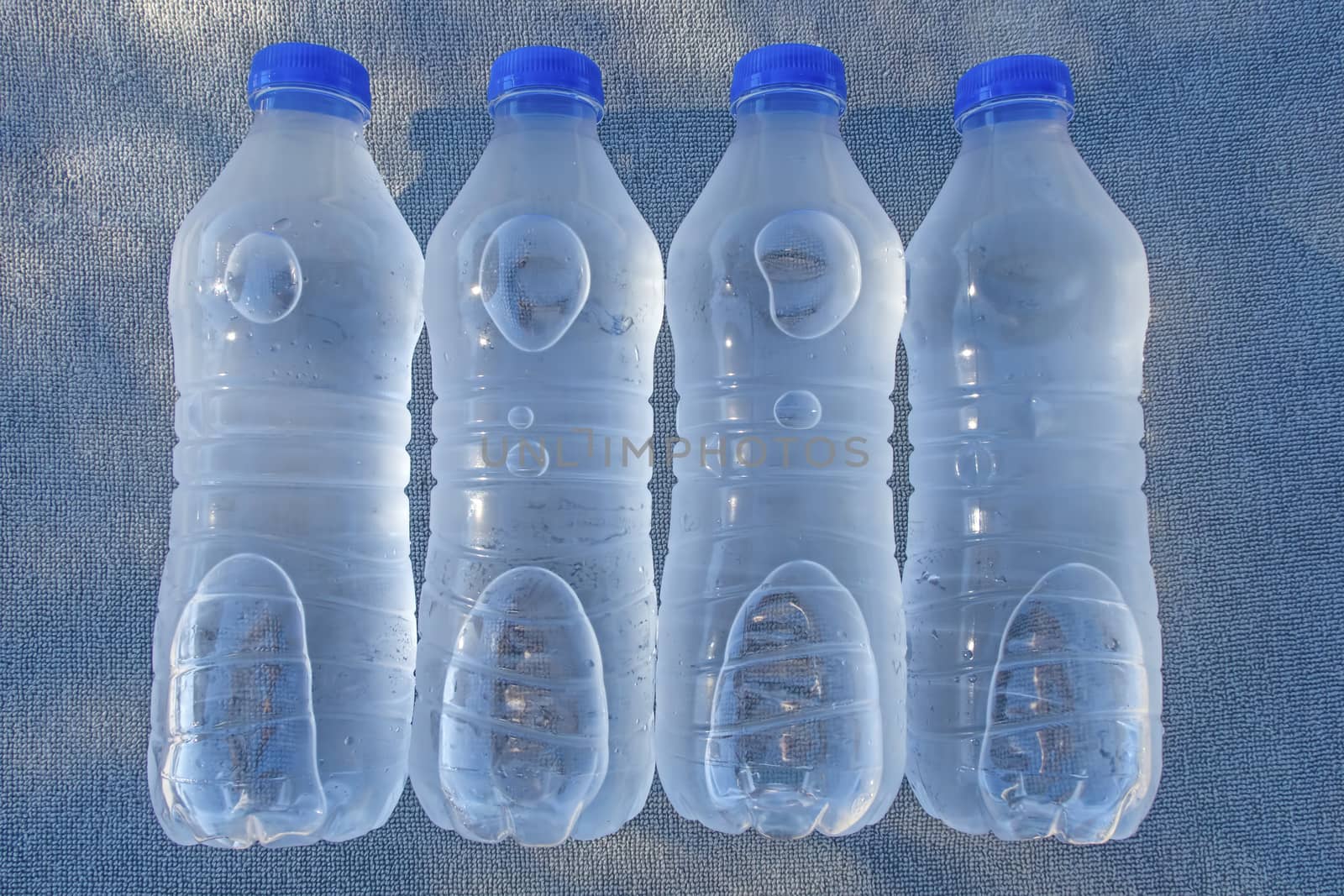 close up plastic water bottles