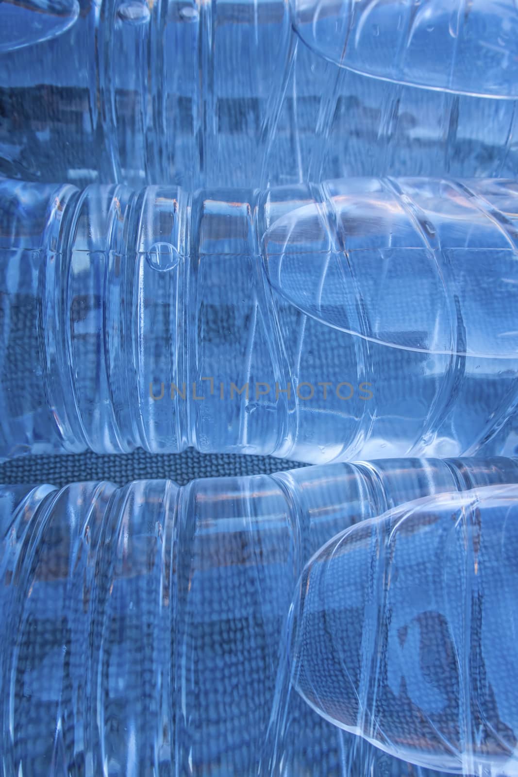 close up plastic water bottles