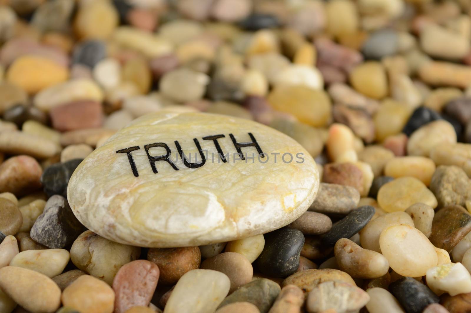 A stone with the word Truth engraved on it for affirmation purposes.