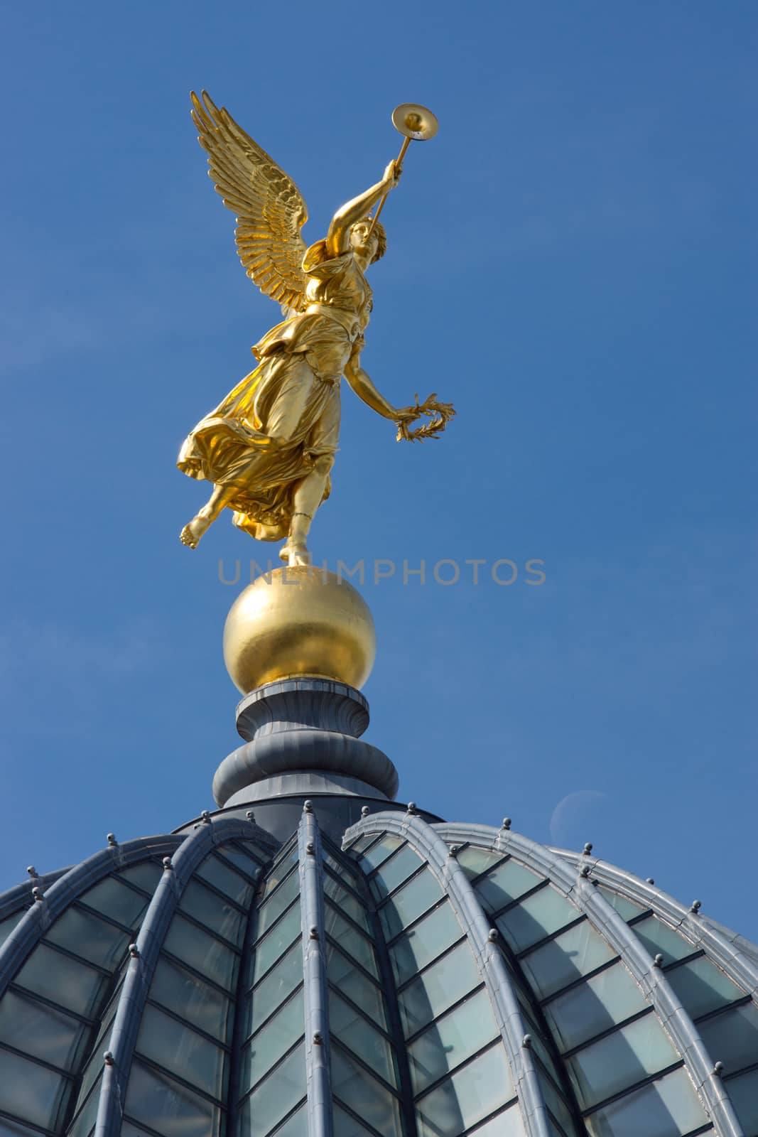 The golden angel on the cuppola of the University of arts in Dresden