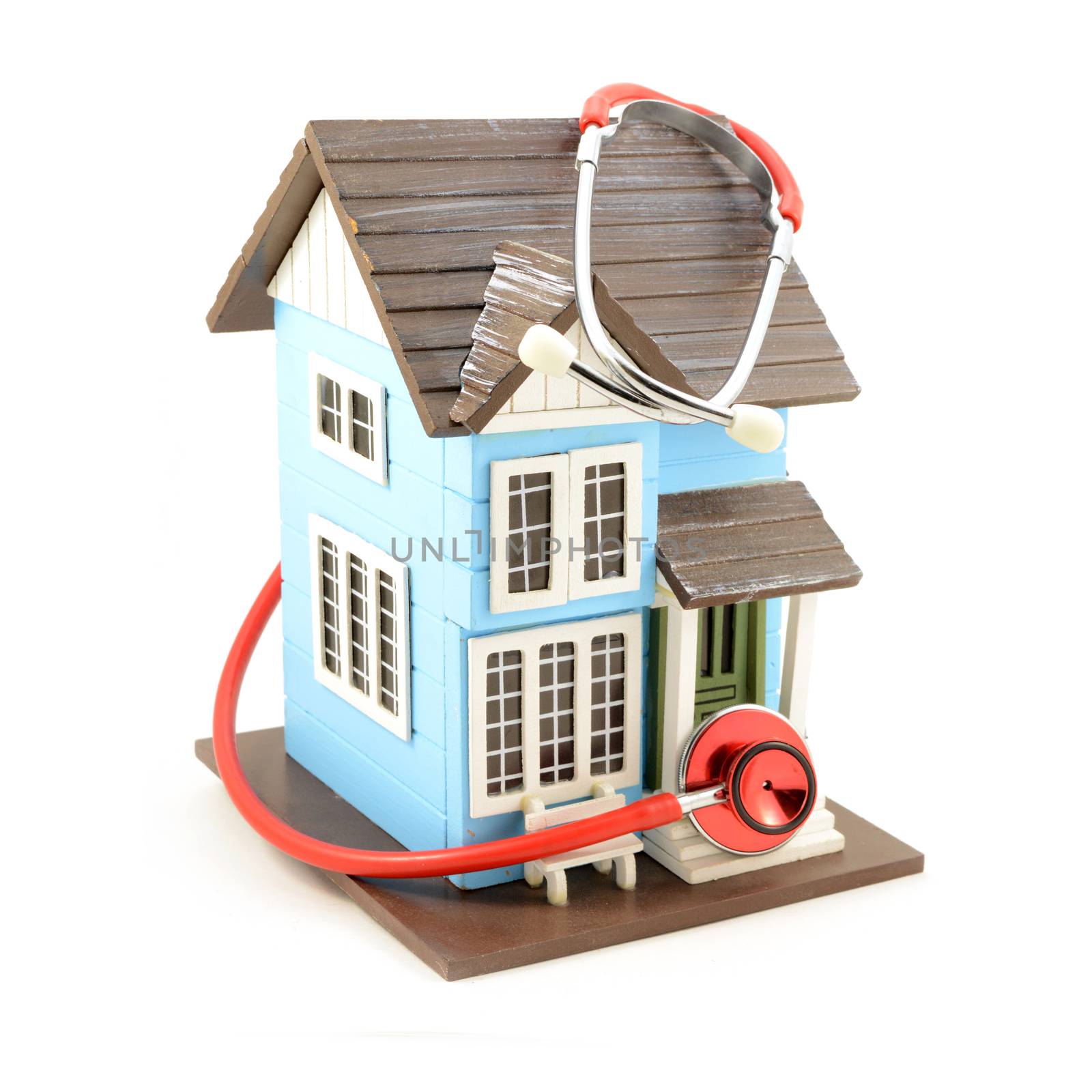 An isolated image of a house with a stethoscope doing a checkup for various concepts.