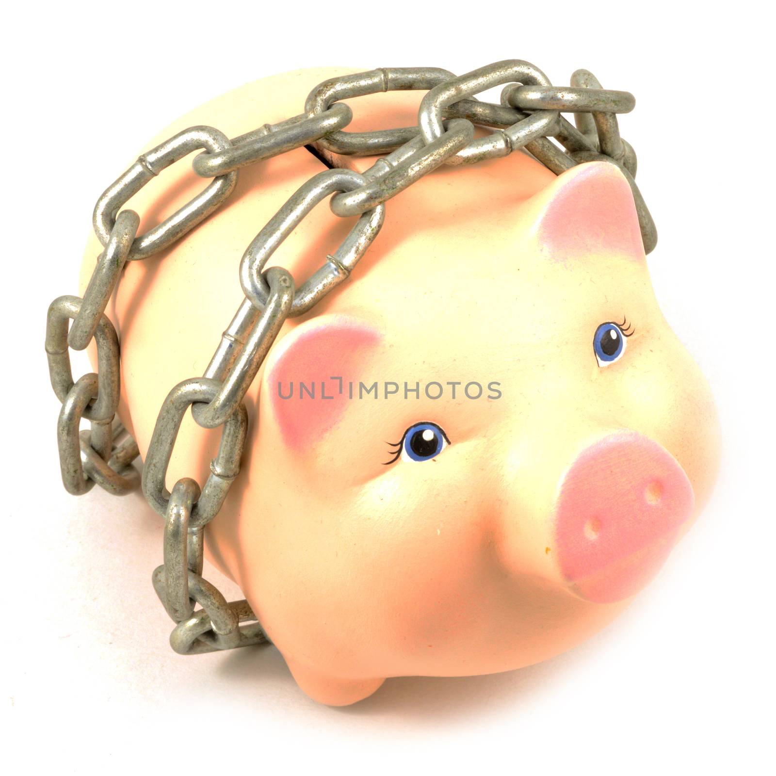 An isolated over white background image of a piggy bank wrapped in a steel chain for added security of savings.