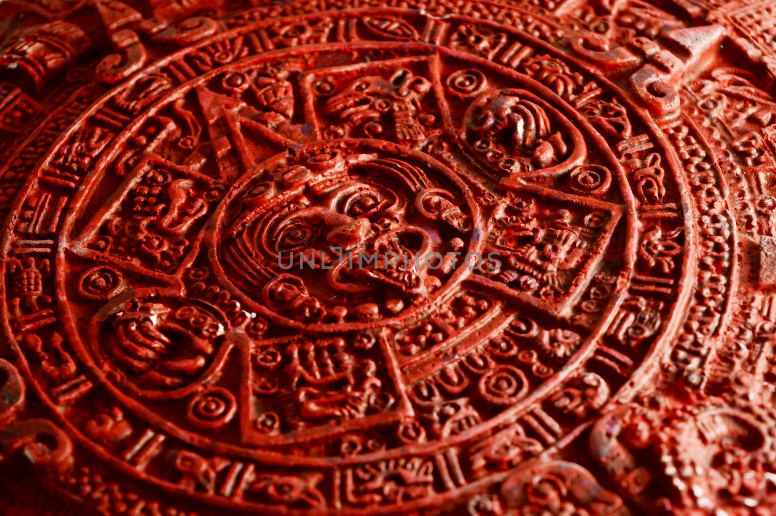 Closeup view of the textured details on a crafted Mayan calendar.
