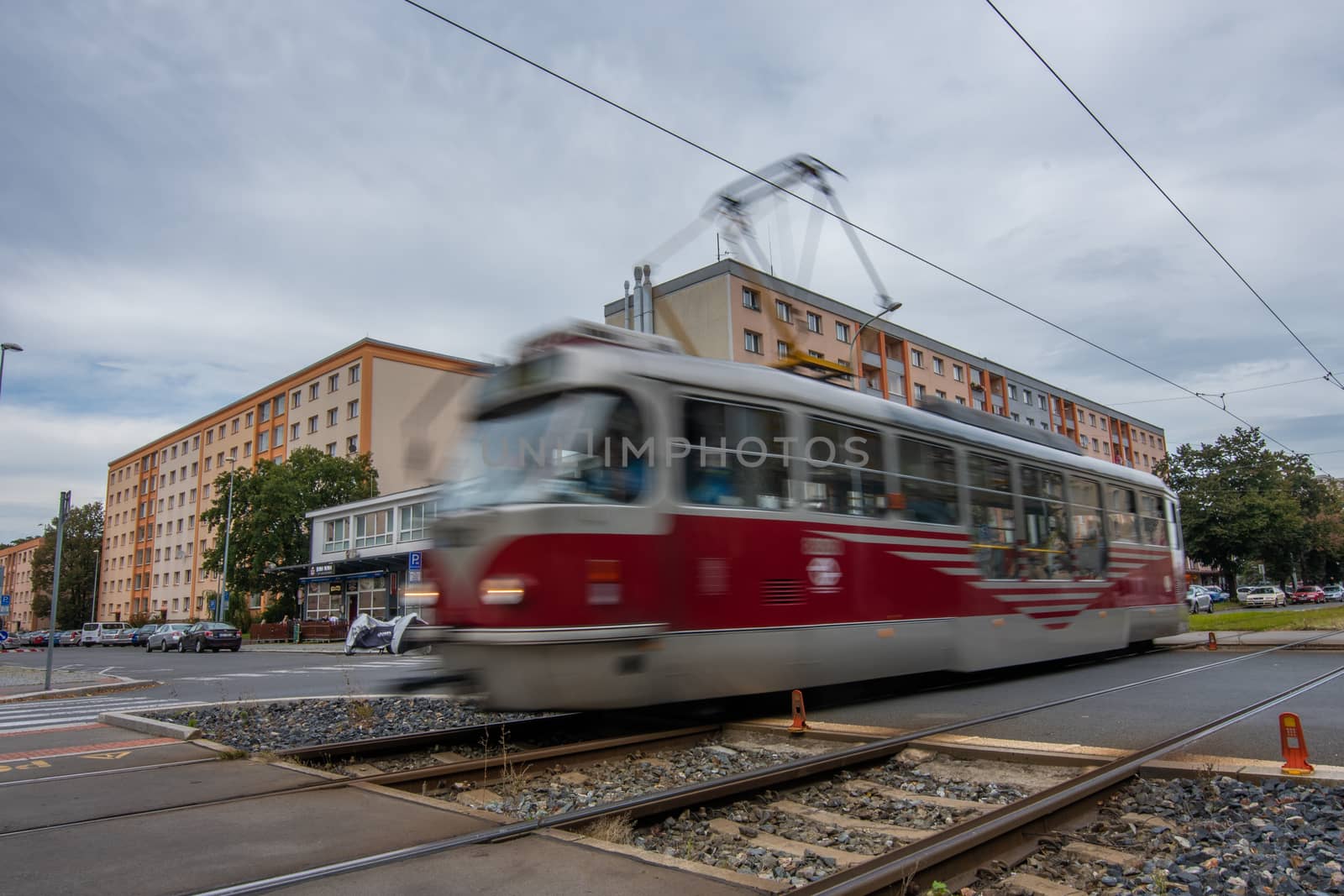10/10/2020. Prague, Czech Republic. Tram driving between big residential buildings Panelaks in Prague Czech Republic by gonzalobell