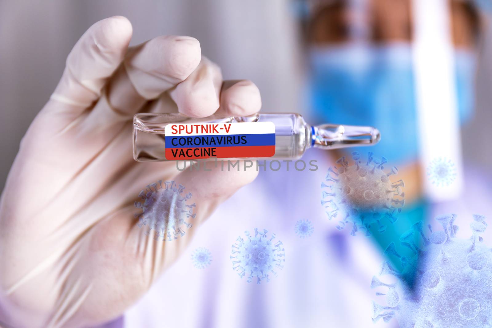 Covid-19 coronavirus vaccine Close up hands of scientist show Covid-19 vaccine name sputnik-v in glass vial with virus background Hands of doctor wear latex glove holding Covid-19 vaccine in bottle