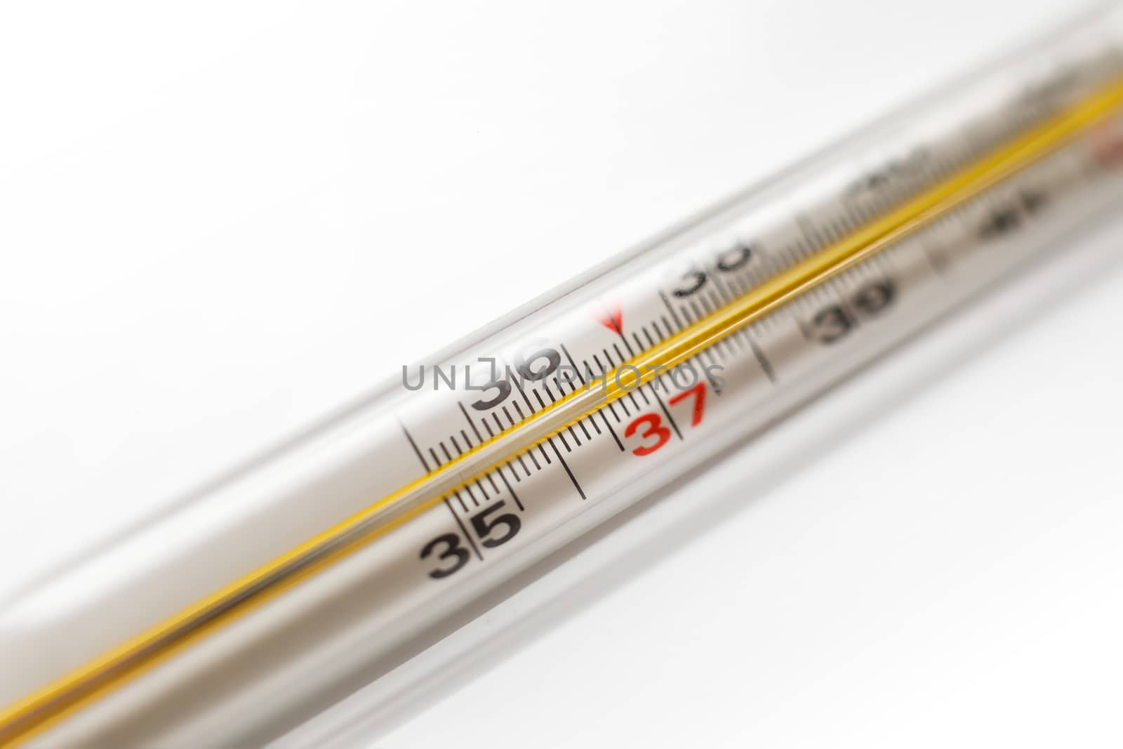 Close-Up of Mercury thermometer.The normal temperature of a healthy person is 36.6