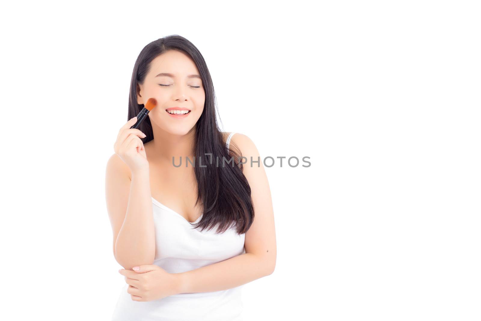 Beauty asian woman applying make up with brush of cheek isolated on white background, beautiful of girl holding blusher, skincare and cosmetic concept.