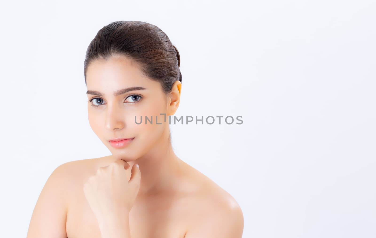 Portrait of beautiful brunette woman makeup of cosmetic, girl hand touch chin and smile attractive, face of beauty perfect with wellness isolated on white background with skin healthcare concept.