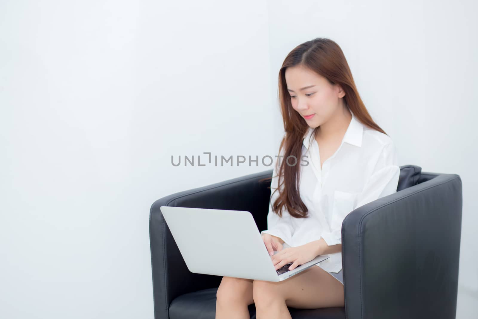 Beautiful of portrait young asian woman using laptop for leisure by nnudoo