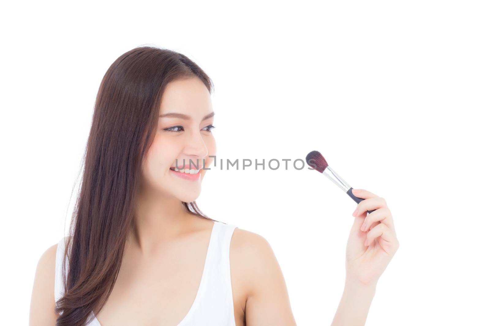 Beauty asian woman applying make up with brush of cheek isolated on white background, beautiful of girl holding blusher, skincare and cosmetic concept.