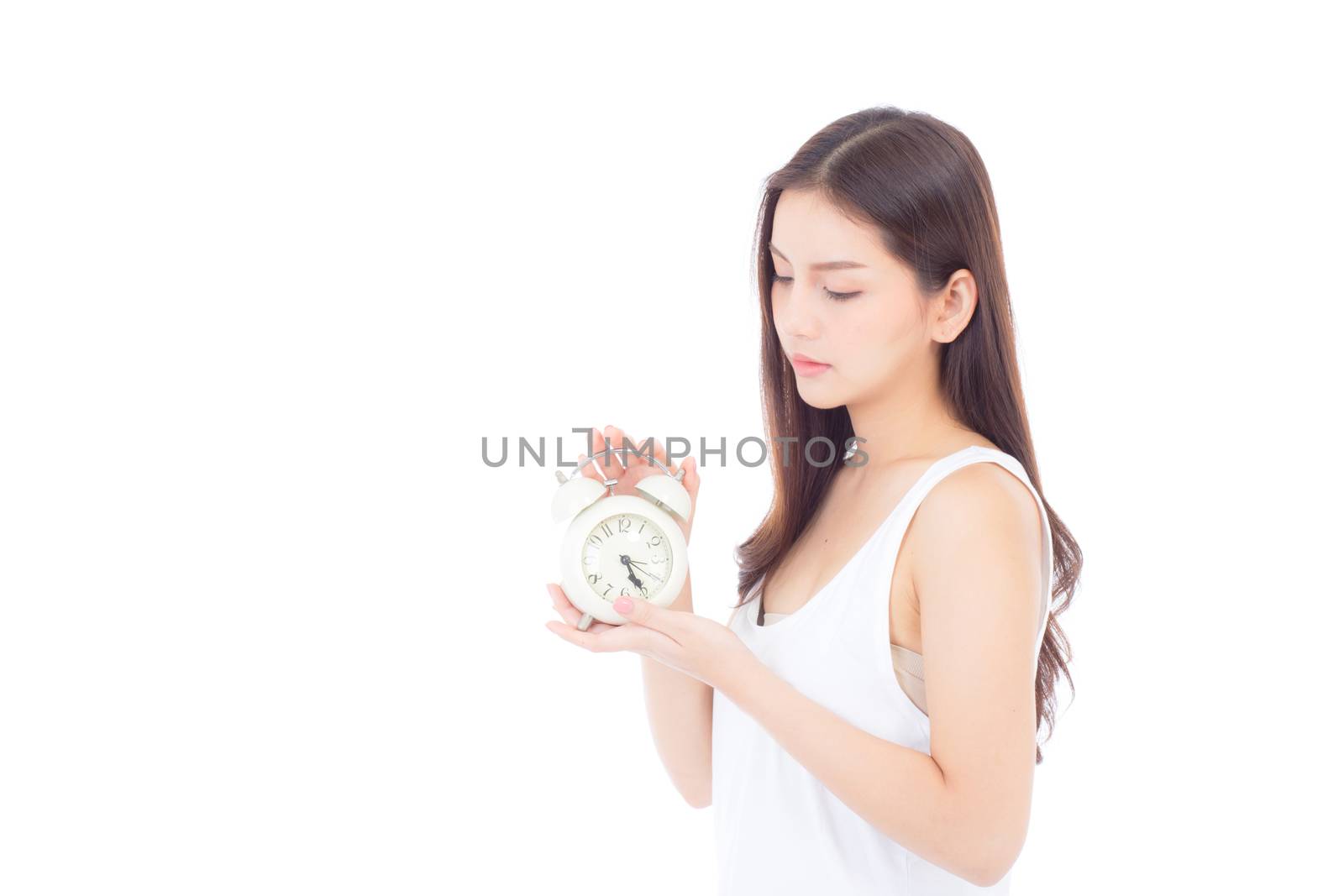 Beautiful asian young woman holding alarm clock, Portrait of woman with wake up, girl with isolated on white background, time with deadline concept.