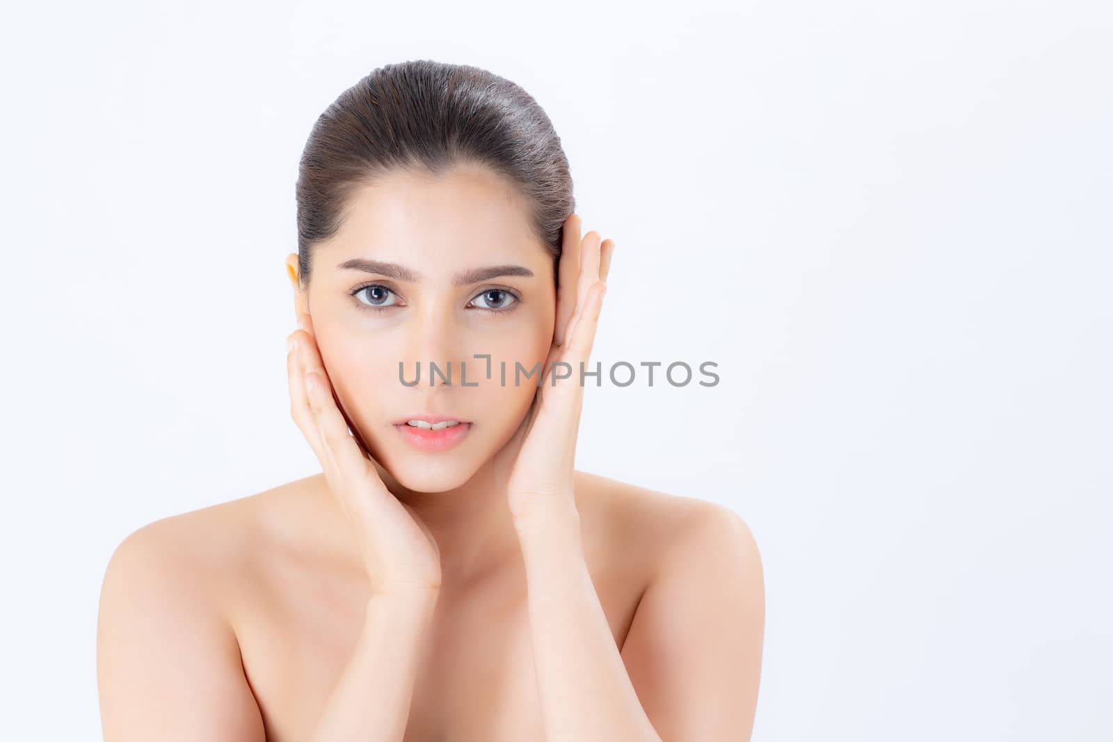 Portrait of beautiful woman makeup of cosmetic, girl hand touch cheek and smile attractive, face of beauty perfect with wellness isolated on white background with skin healthcare concept.