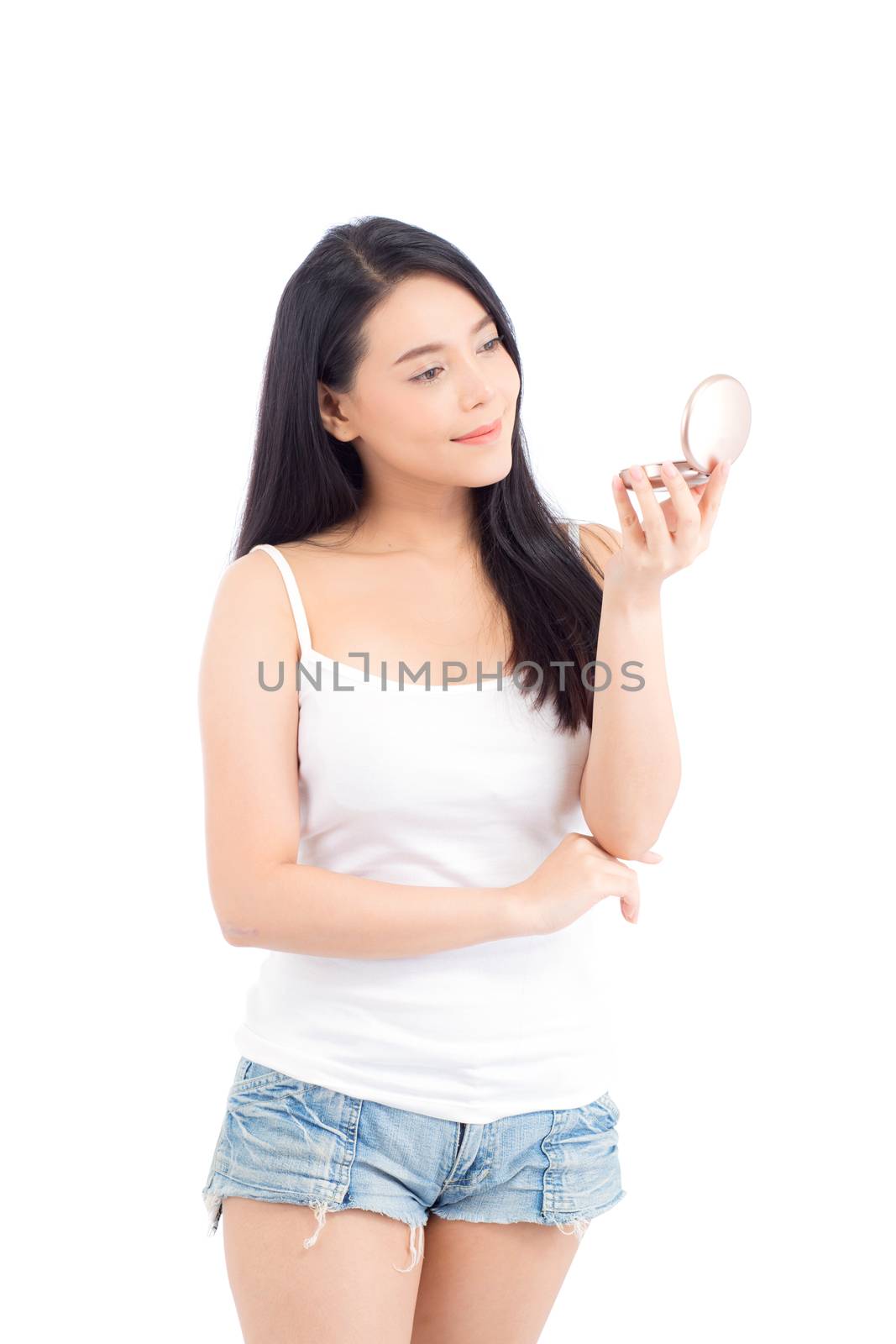 Portrait of beautiful asian woman applying powder puff at cheek makeup of cosmetic, beauty of girl with face smile isolated on white background, wellness and healthcare concept.