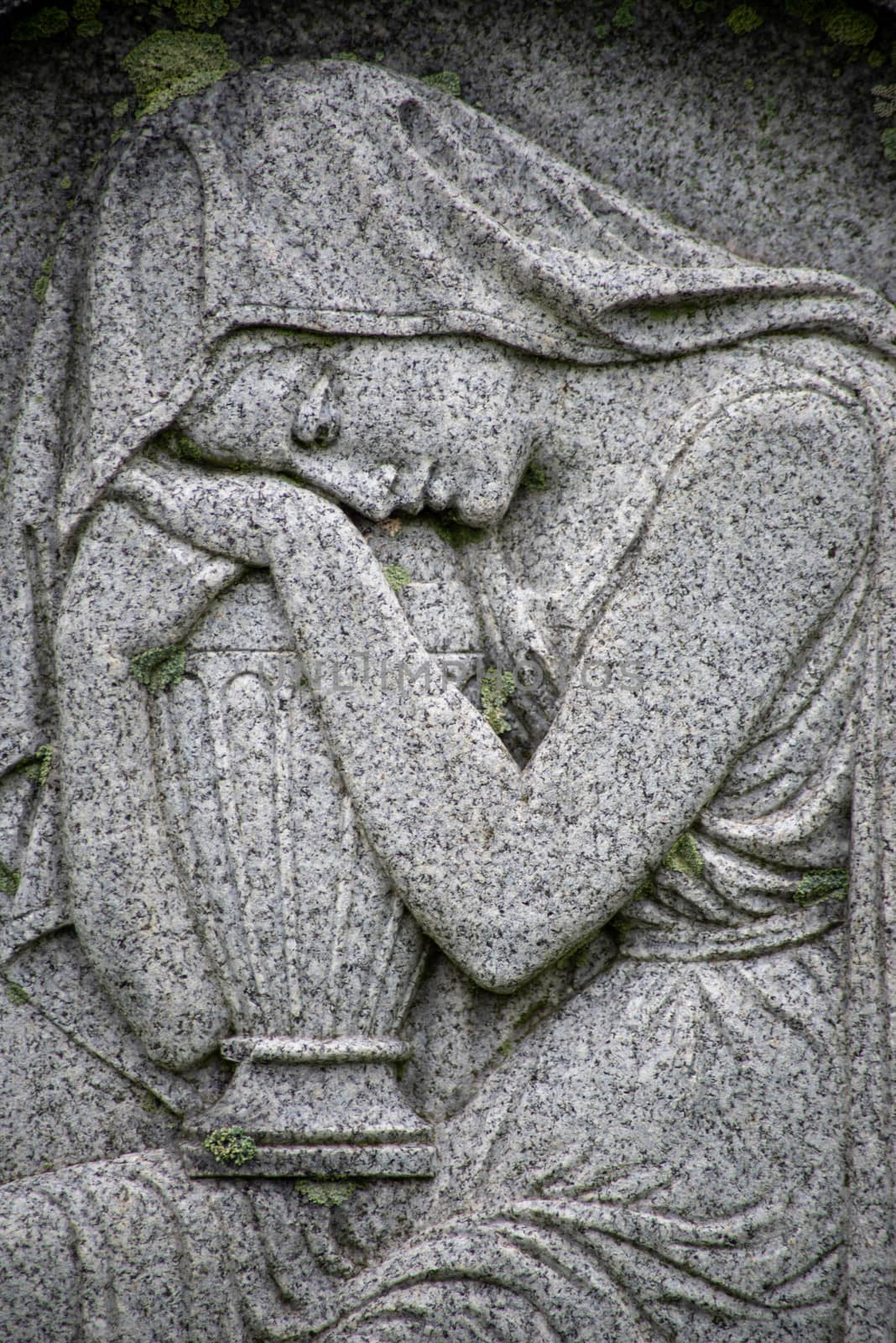 Woman on a Victorian tombstone embraces an urn by marysalen