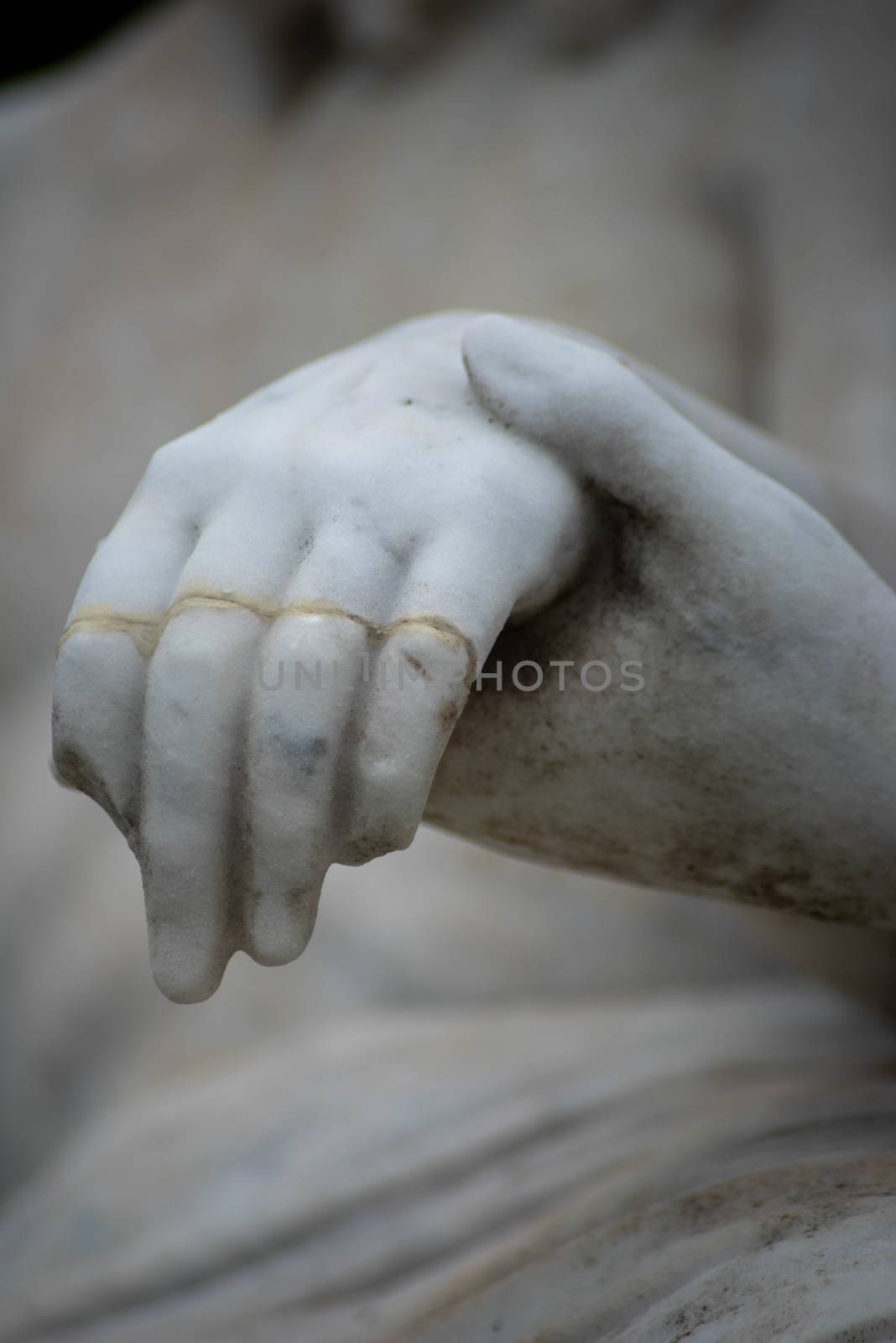 Mary holds Jesus's broken hand in a Victorian cemetery pieta, beautiful tenderness in natural light with copy space