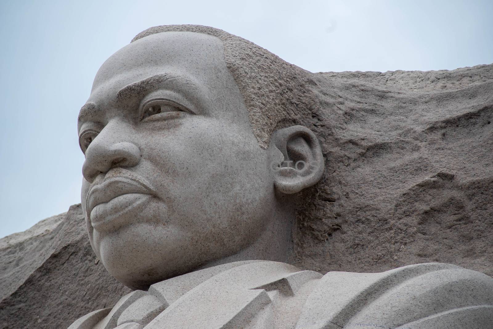 Closeup of the pink granite monument to the great Dr. Martin Luther King. Pale blue sky. Editorial use.