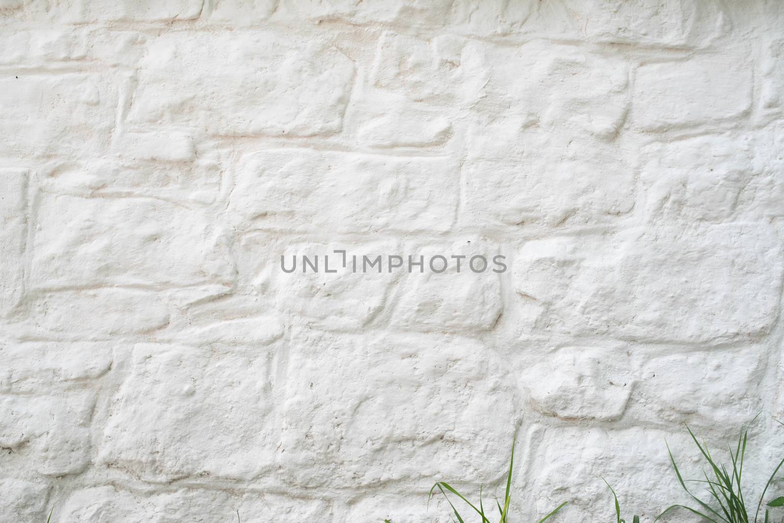 Detail and texture of whitewashed stone all. Ancient construction is sturdy and strong. Natural light with copy space