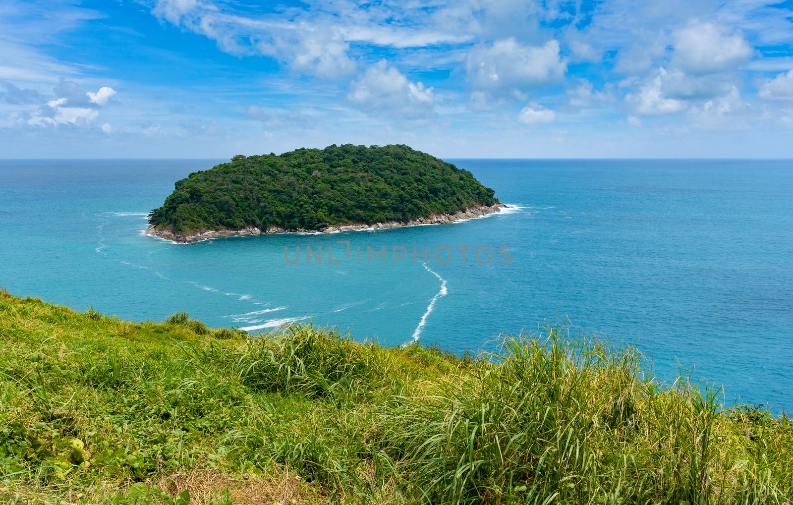 Tropical paradise in in blue sea and sky at Phuket island, Thailand.