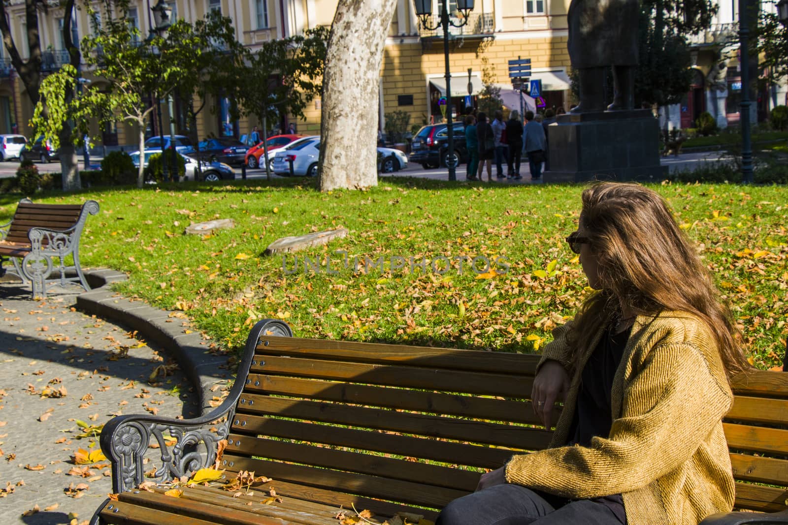 Beautiful young woman in the park, autumn nature and ginger hair woman.