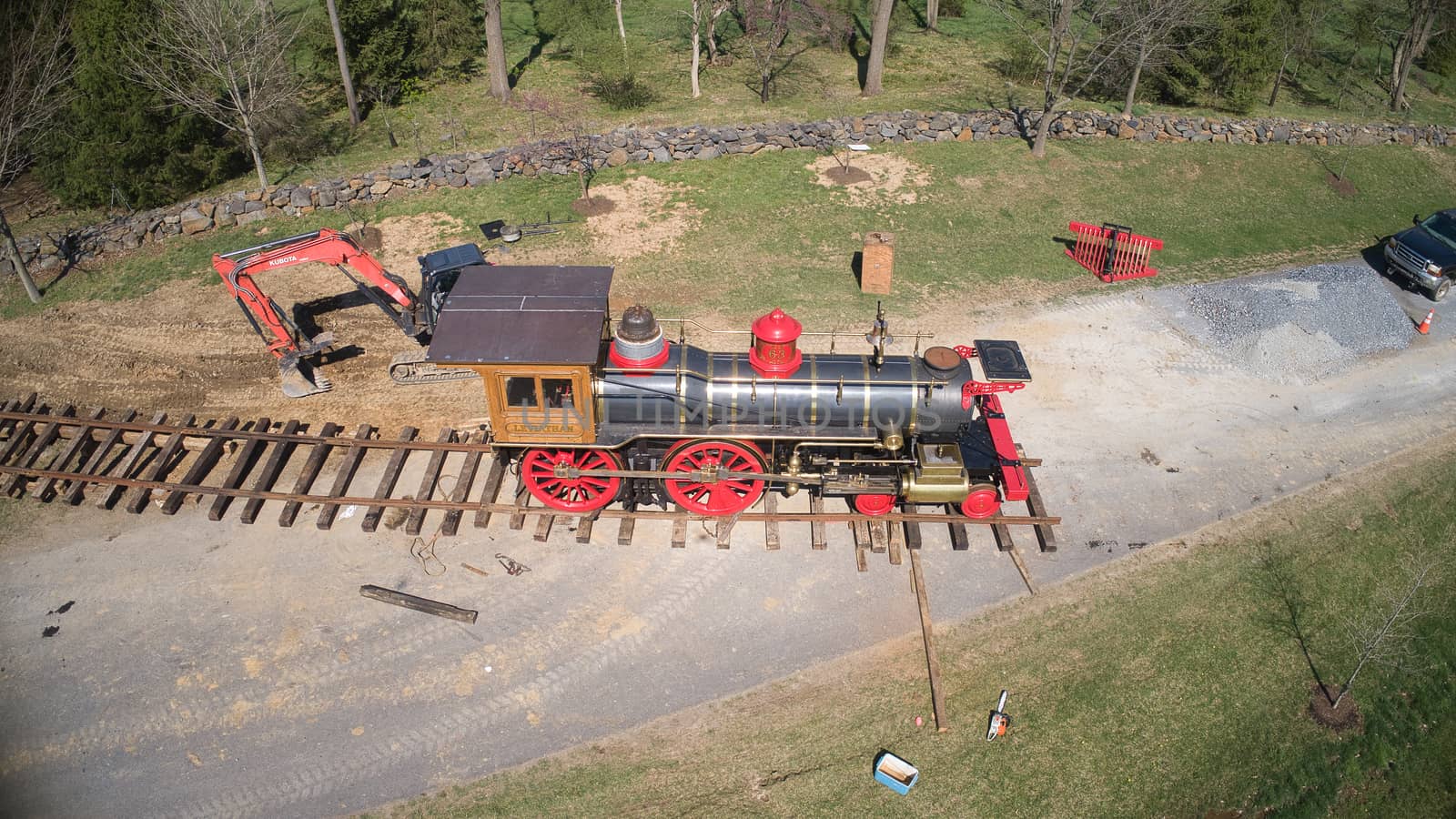 Aerial View of a Replica of an Old 1860's Steam Engine Being Assembled onto the Tracks Ready on a Sunny Spring Day