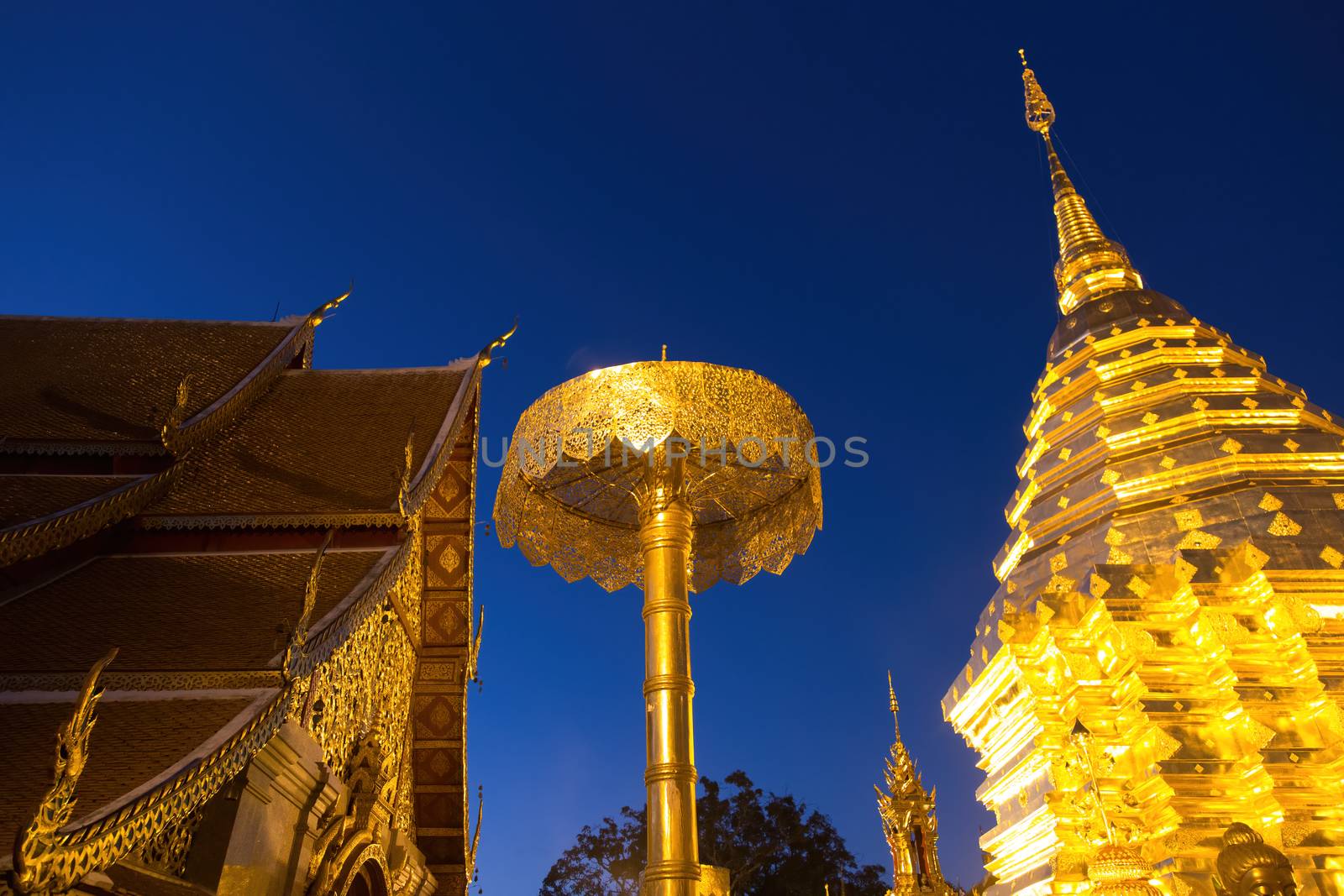 Wat Phra That Chang Mai Thailand 12.9.2015 golden Buddhist temple  by kgboxford