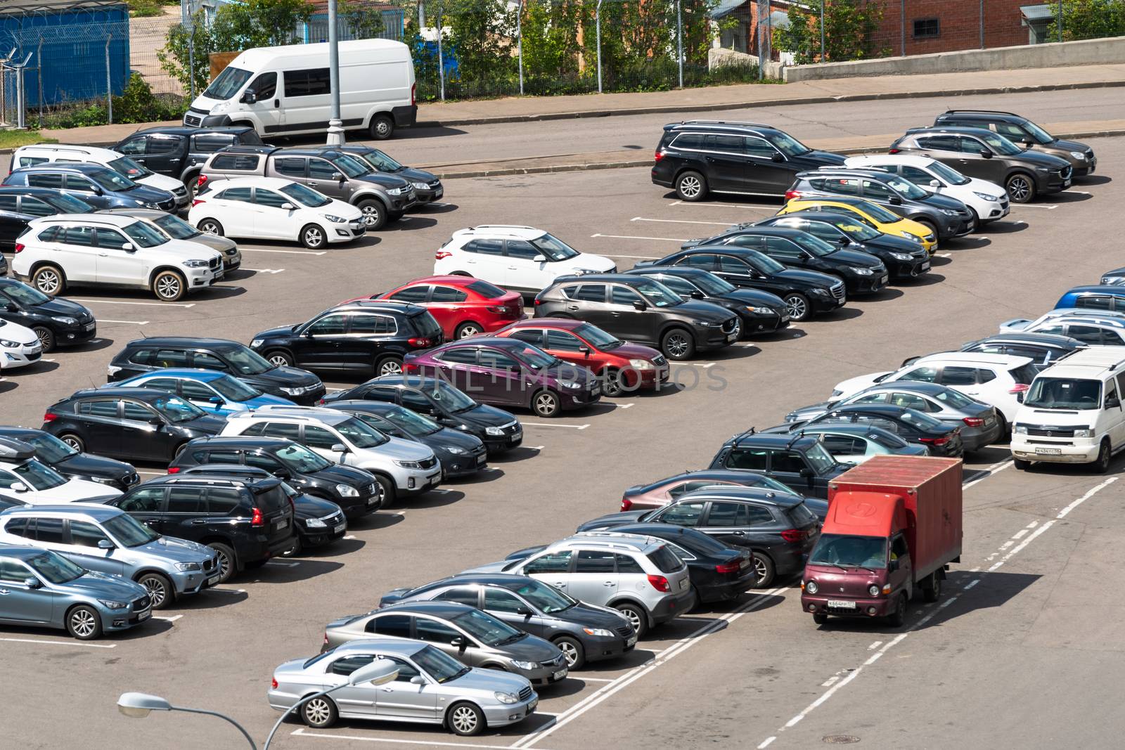 July 2, 2019 Moscow, Russia. Cars in a parking lot near the Vnukovo International Airport in Moscow.