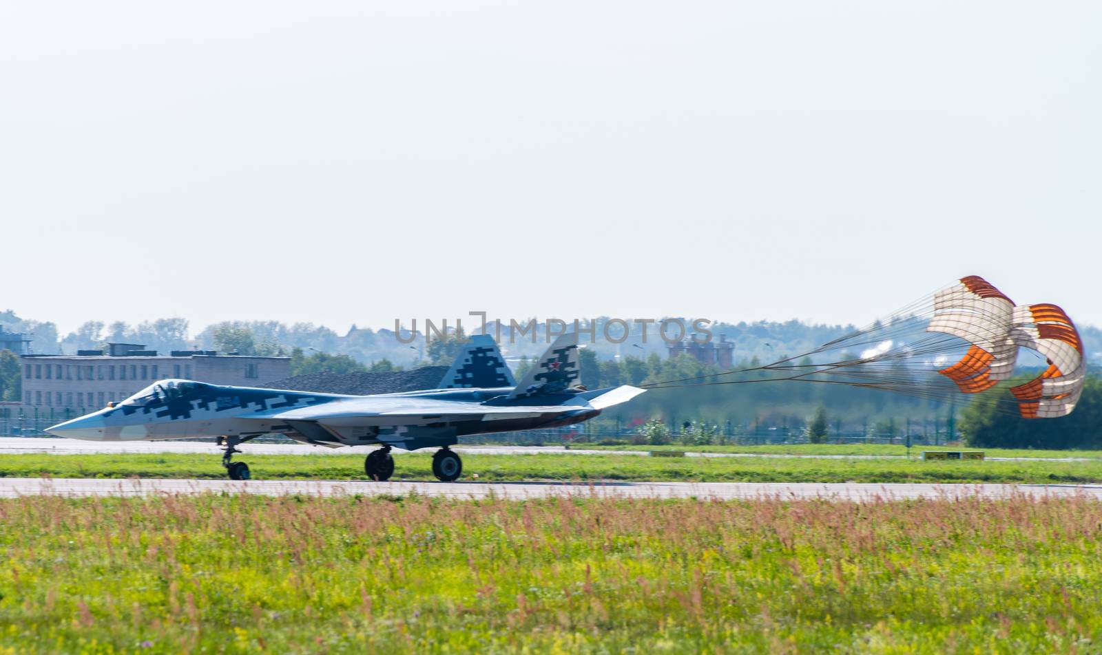 August 30, 2019. Zhukovsky, Russia. fifth-generation promising Russian multi-functional fighter Sukhoi Su-57 with a released parachute at the International Aviation and Space Salon MAKS 2019.