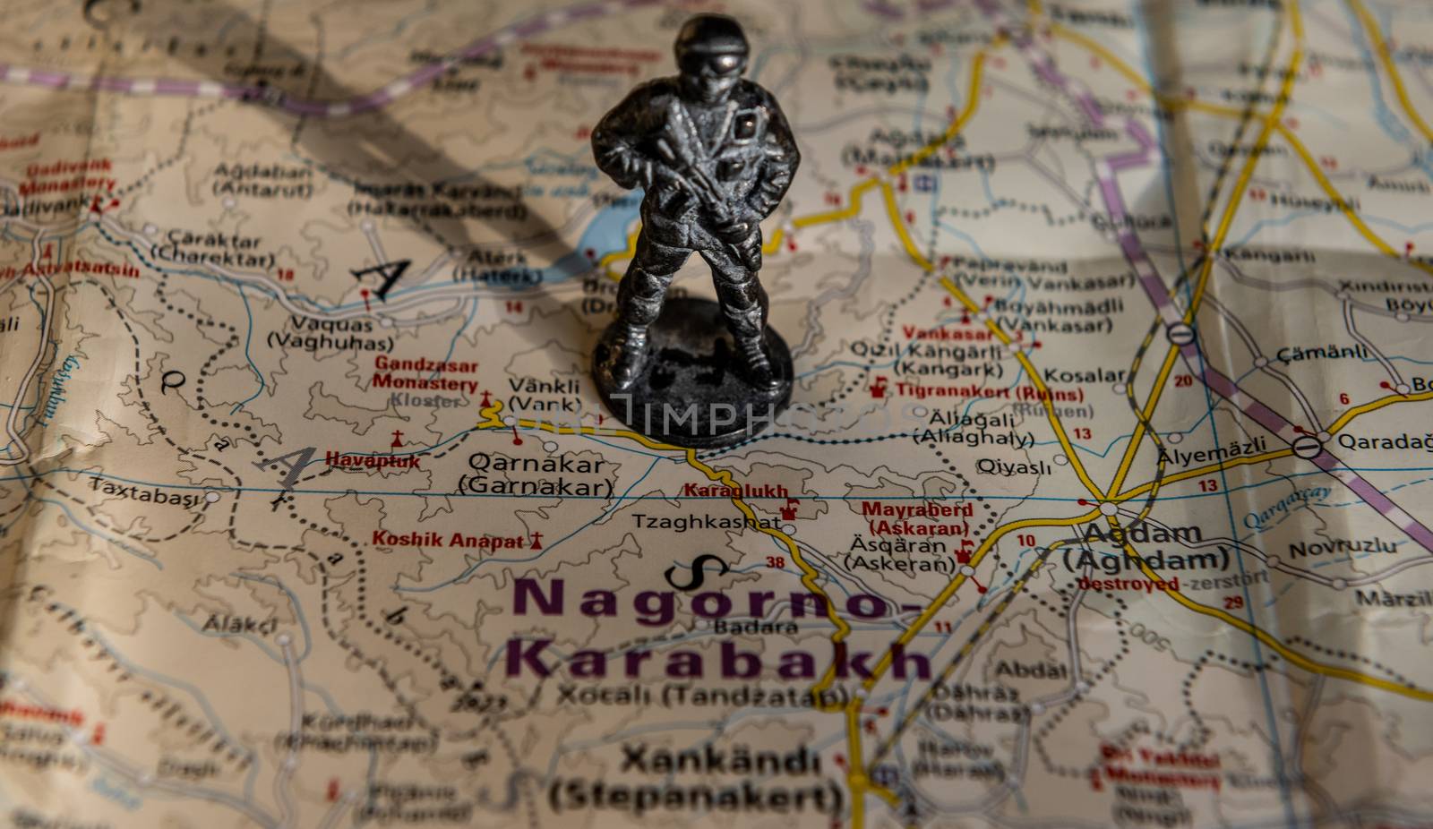 A figurine of an armed soldier on the map of Nagorno-Karabakh.