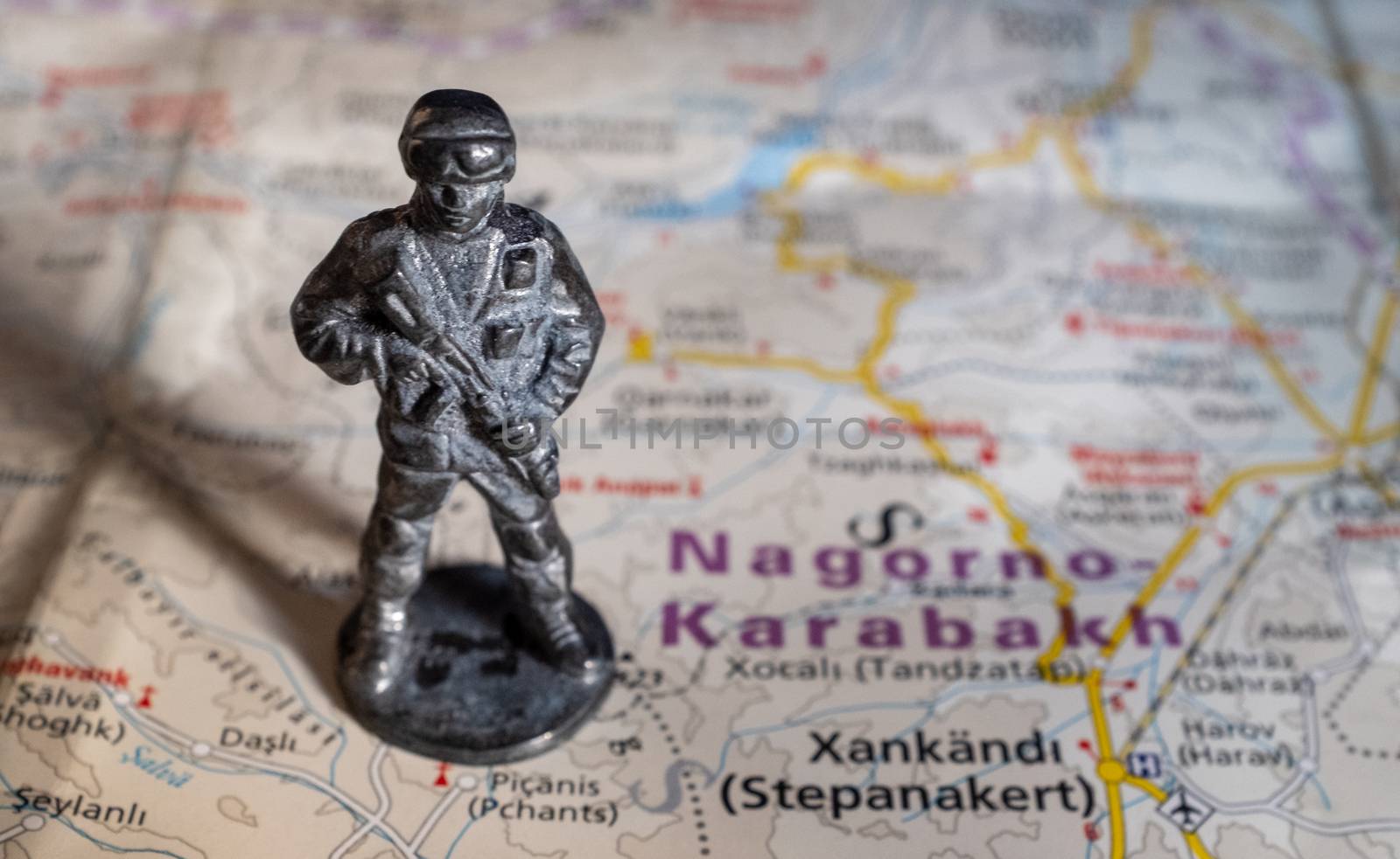 A figurine of an armed soldier on the map of Nagorno-Karabakh.