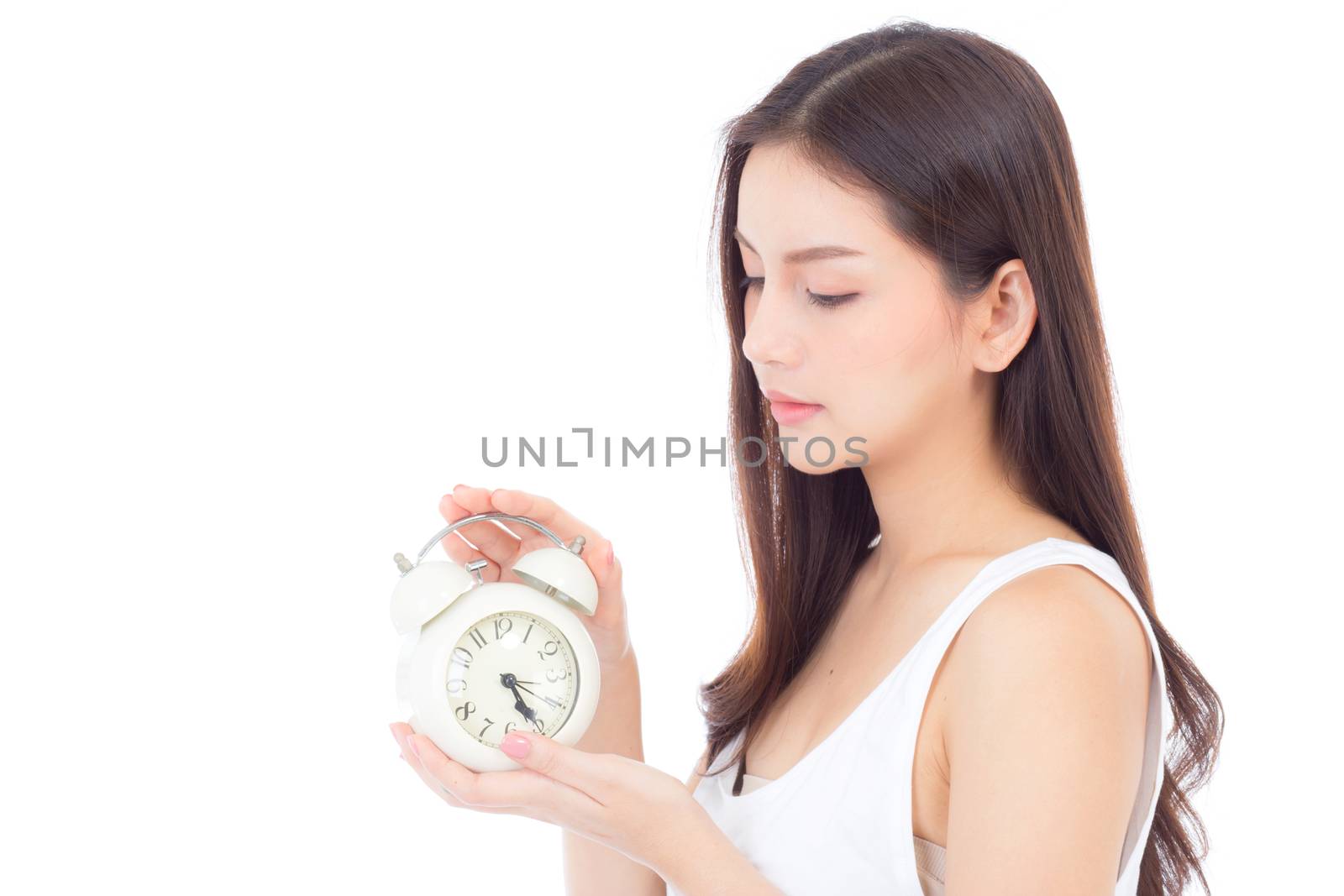 Beautiful asian young woman holding alarm clock, Portrait of woman with wake up, girl with isolated on white background, time with deadline concept.