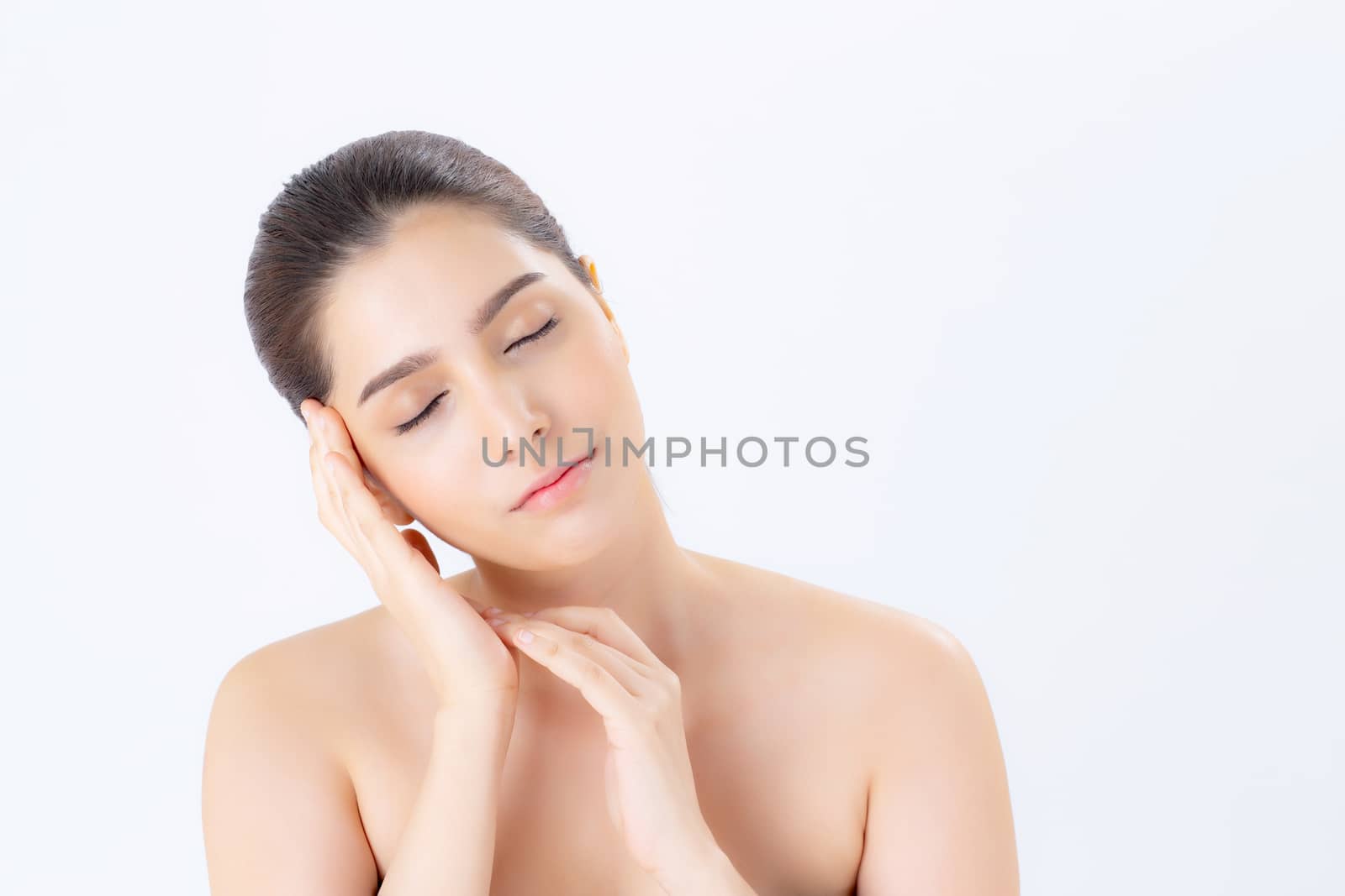 Portrait of beautiful woman makeup of cosmetic, girl hand touch cheek and smile attractive, face of beauty perfect with wellness isolated on white background with skin healthcare concept.