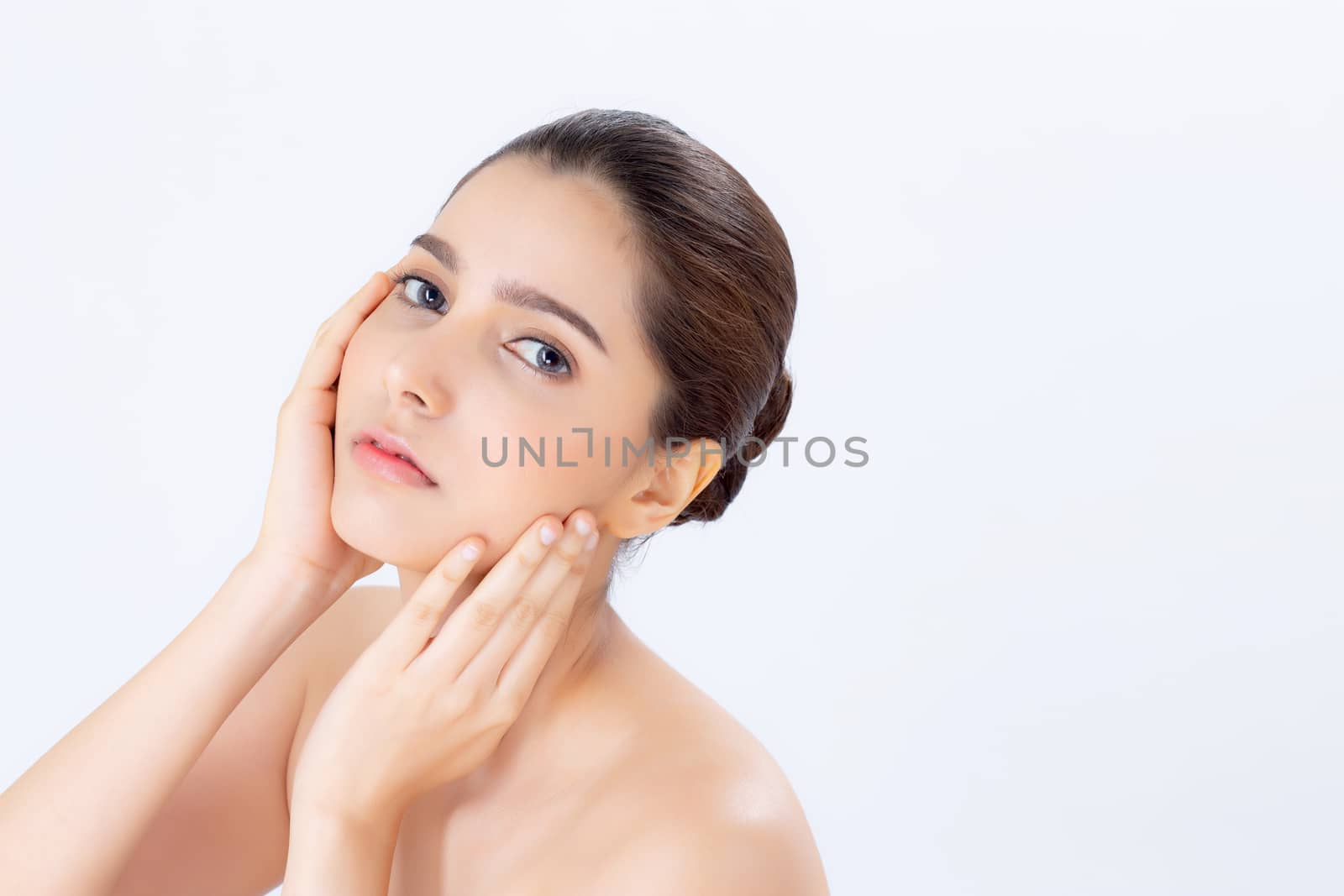 Portrait of beautiful woman makeup of cosmetic, girl hand touch cheek and smile attractive, face of beauty perfect with wellness isolated on white background with skin healthcare concept.