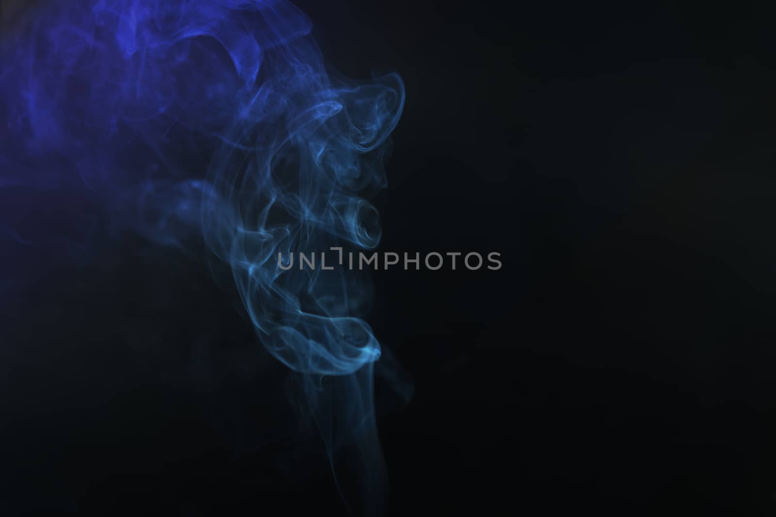 Movement color smoke girl black background with copy space. by noppha80