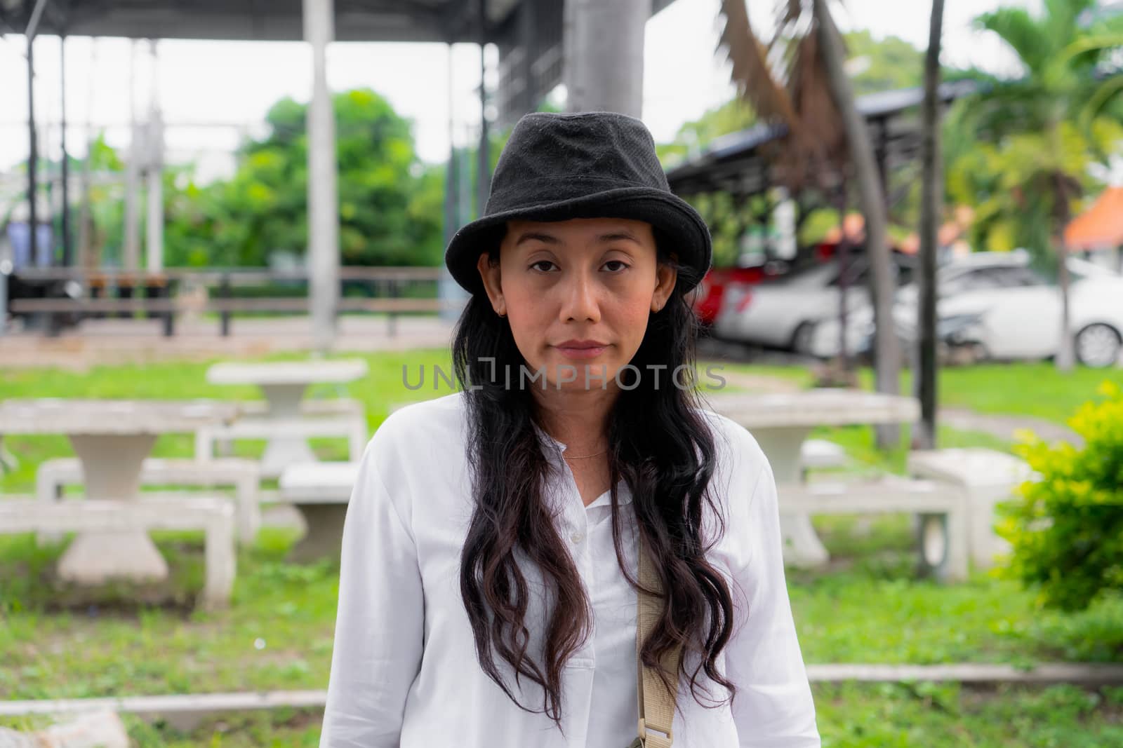 Portrait woman wearing black hat