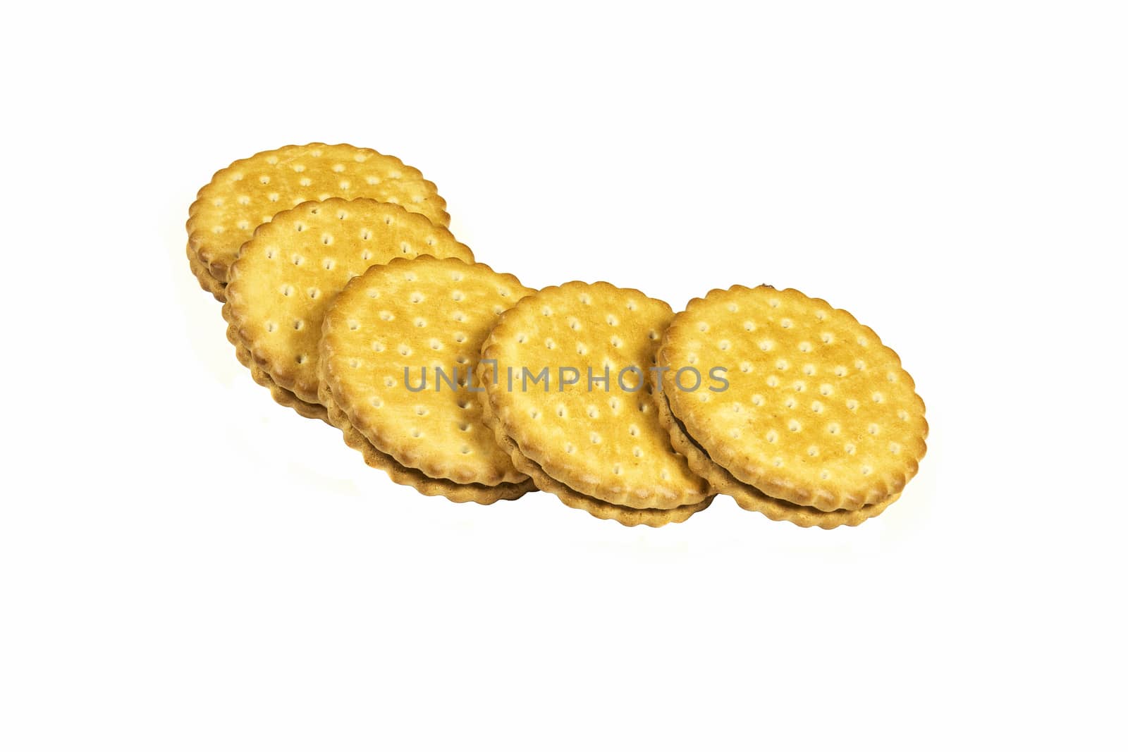 Round biscuits with chocolate filling lie on a light background