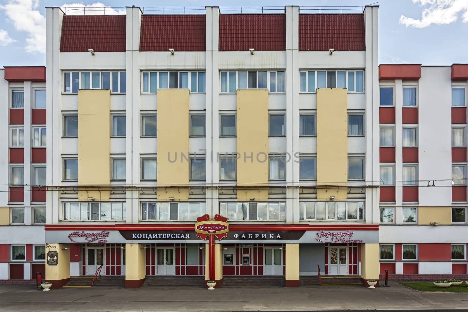 Administrative building of the confectionery factory "Kommunarka" against the blue sky (Minsk, Belarus)