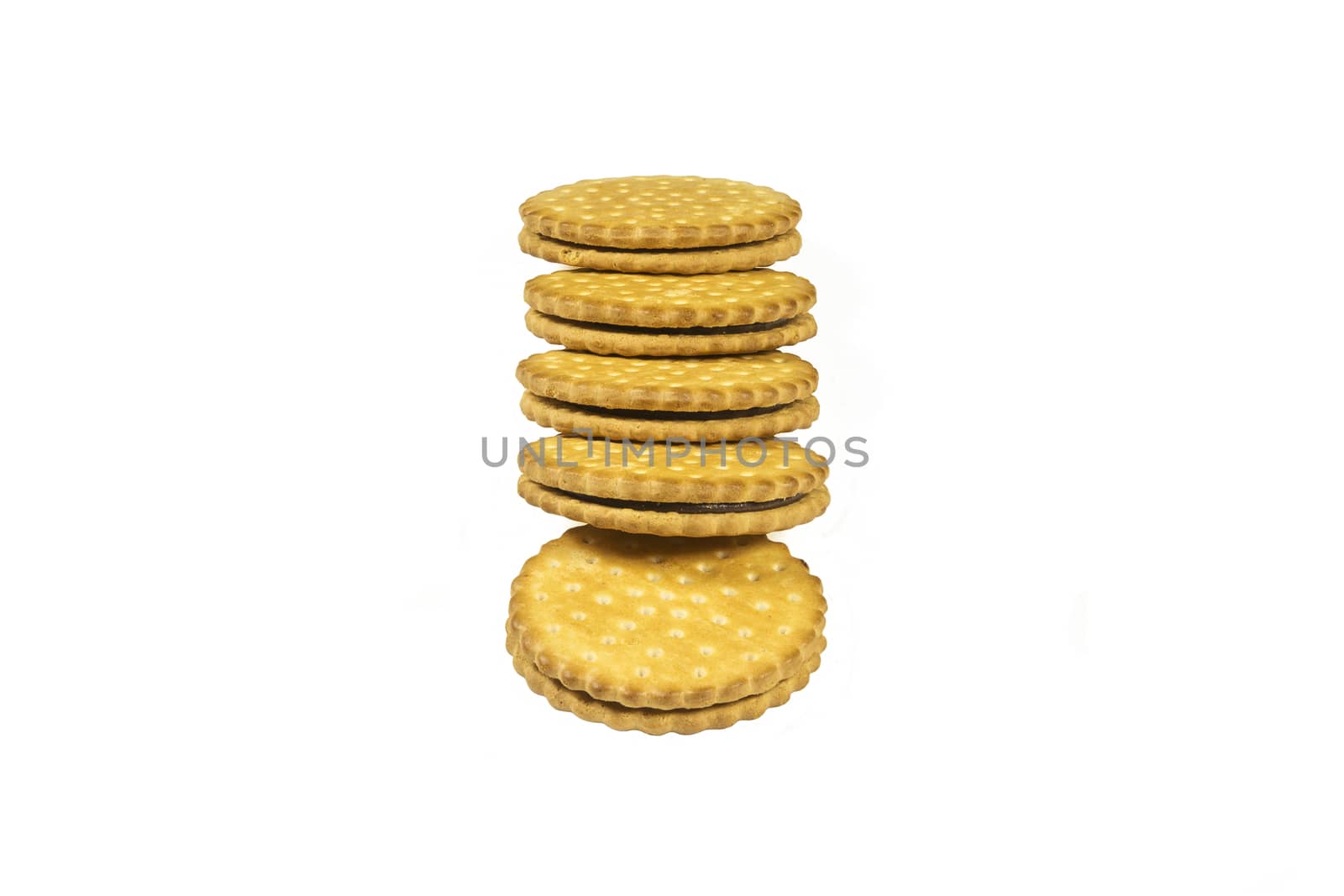 Round biscuits with chocolate filling on a light background