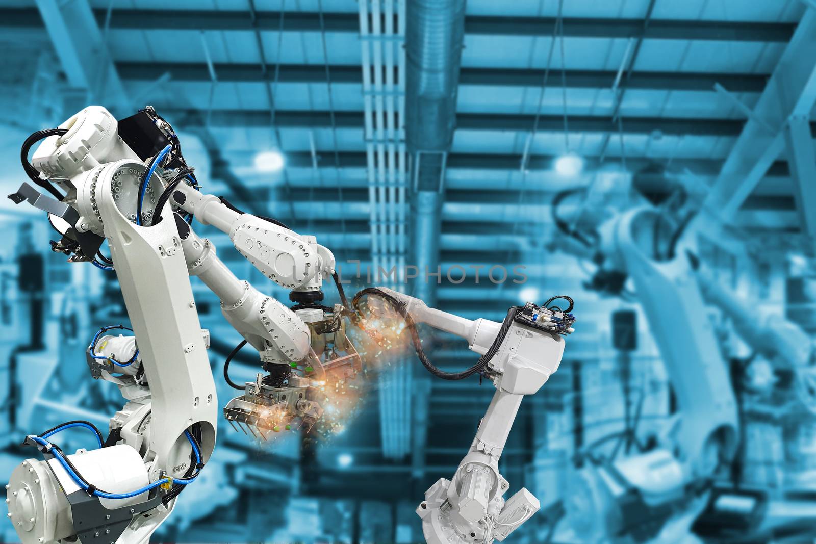 Robotic arms, industrial robots, factory automation machines by sompongtom