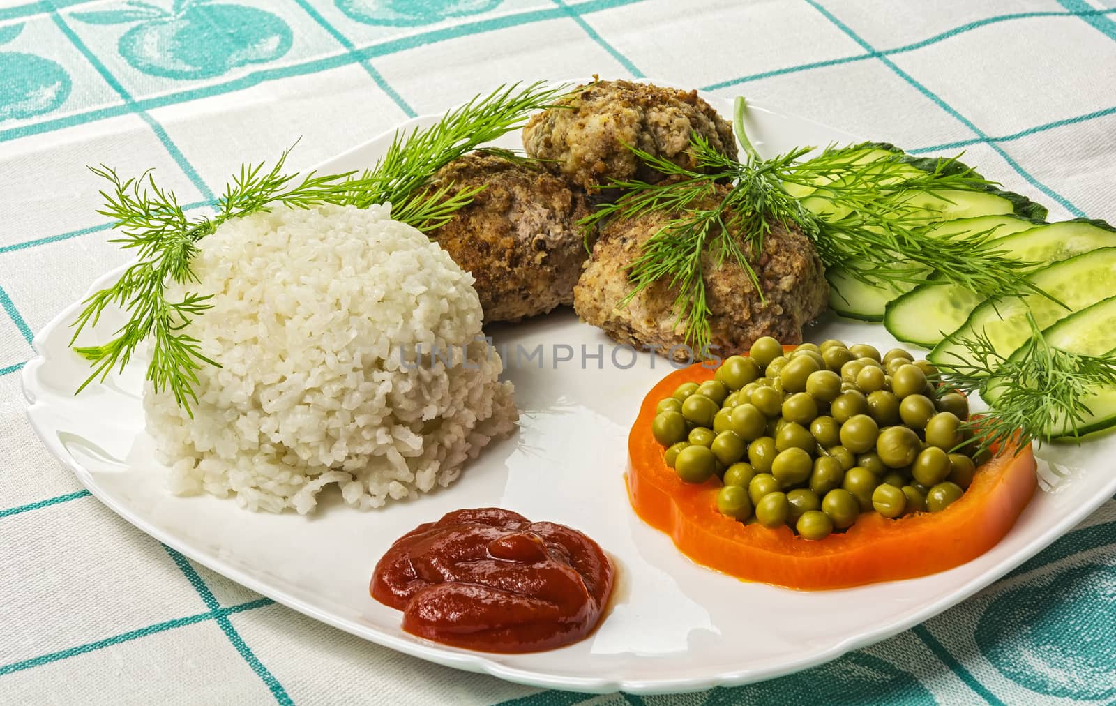 Food. Meat cutlet with boiled rice and vegetables